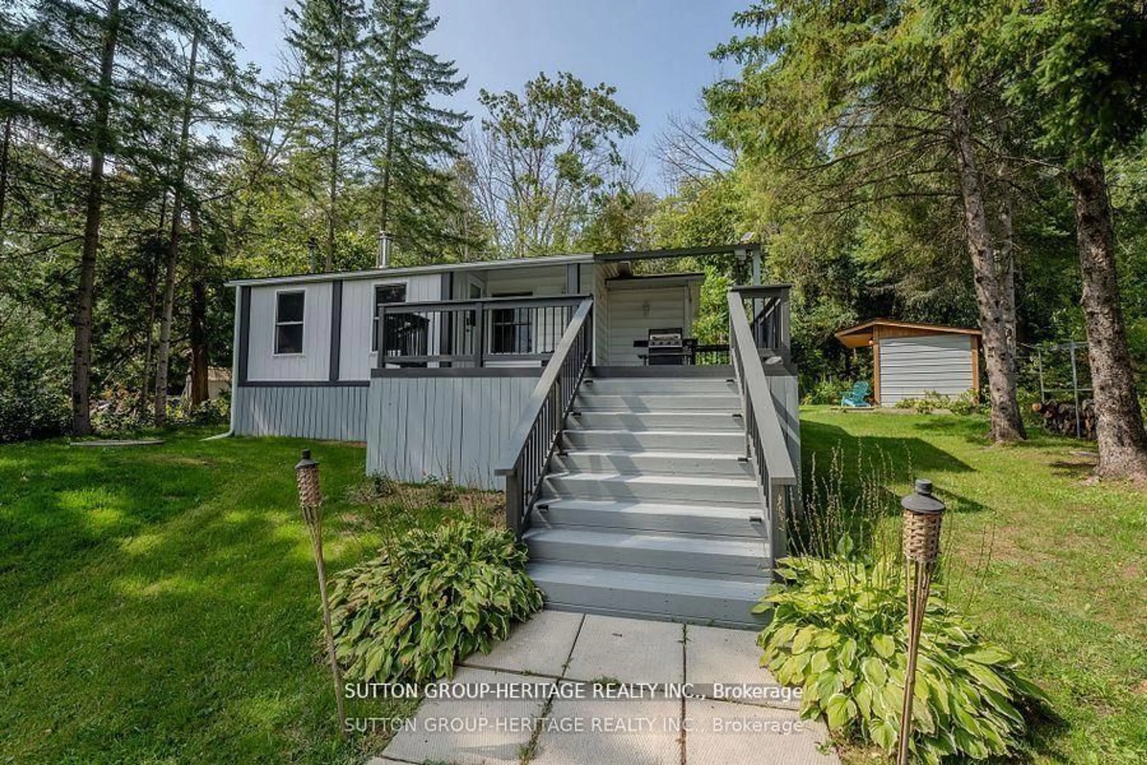 Home with vinyl exterior material, street for 682 North Shore Dr, Otonabee-South Monaghan Ontario K0L 1B0