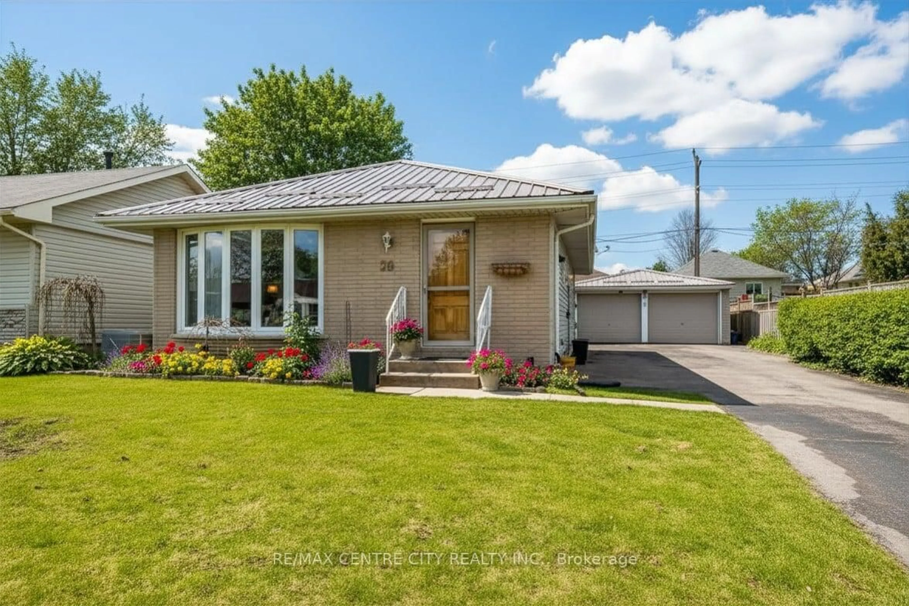 Home with brick exterior material, street for 26 Manor Rd, St. Thomas Ontario N5R 5C9