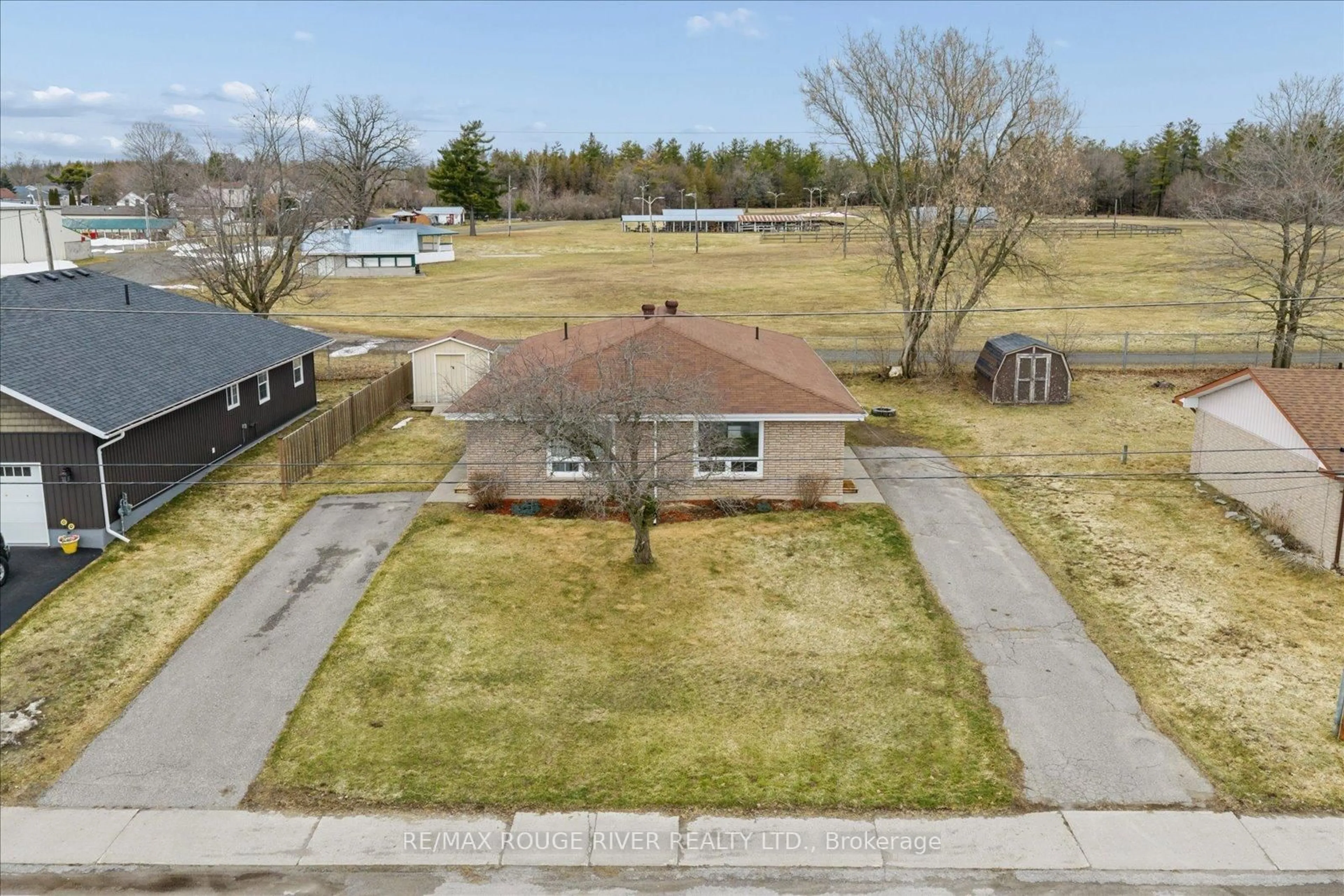A pic from outside/outdoor area/front of a property/back of a property/a pic from drone, street for 6 Crawford Dr, Limoges Ontario K0K 2M0