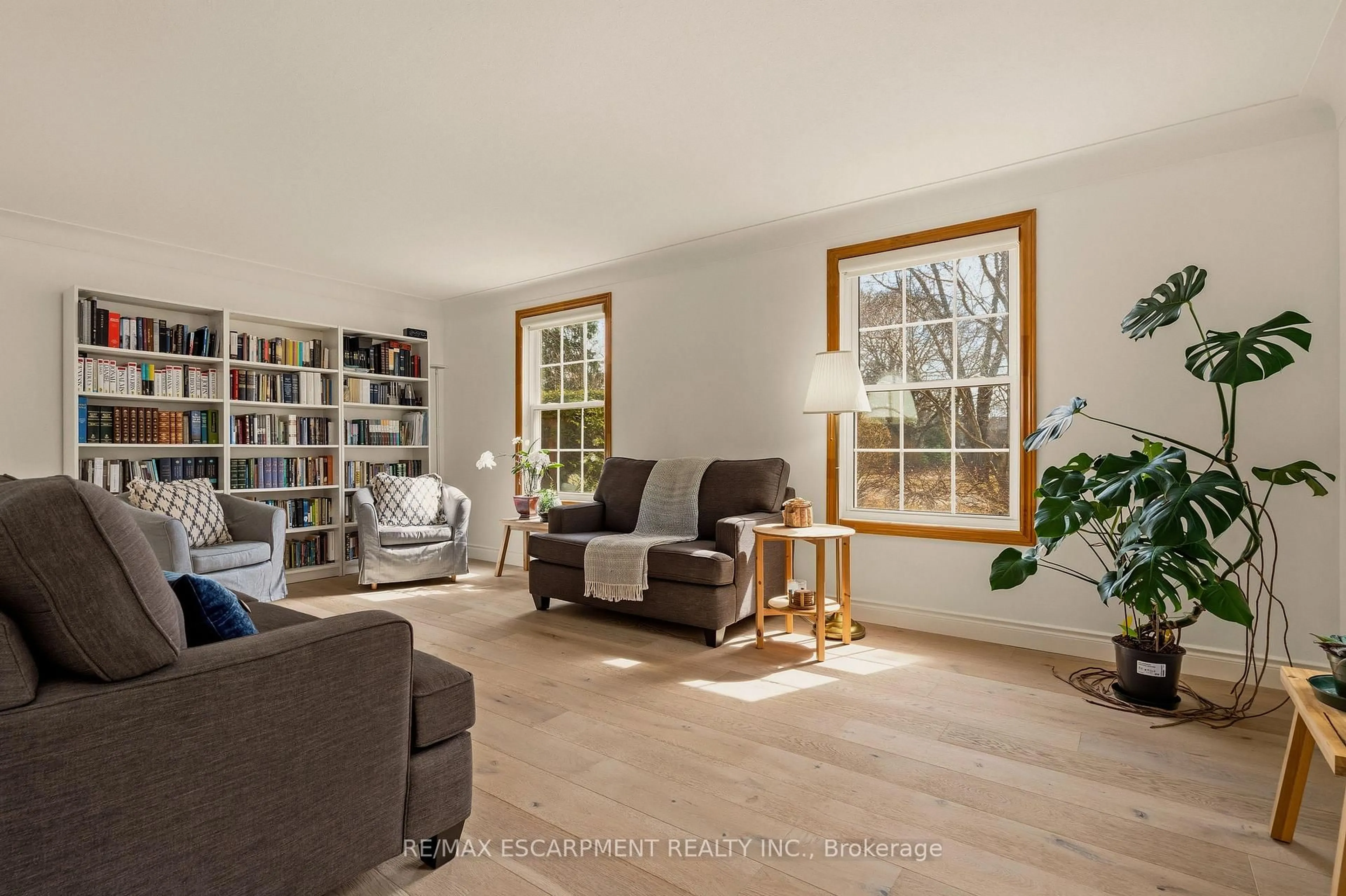 Living room with furniture, wood/laminate floor for 3 Postans Path, Hamilton Ontario L9G 3P8