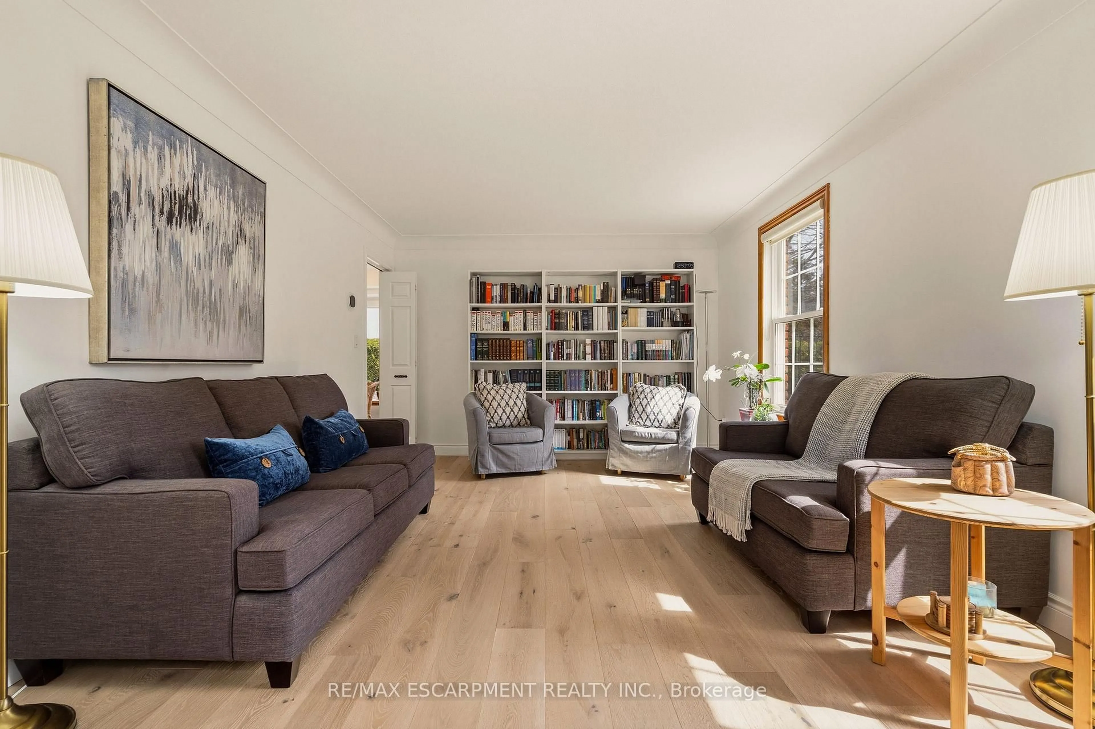 Living room with furniture, wood/laminate floor for 3 Postans Path, Hamilton Ontario L9G 3P8