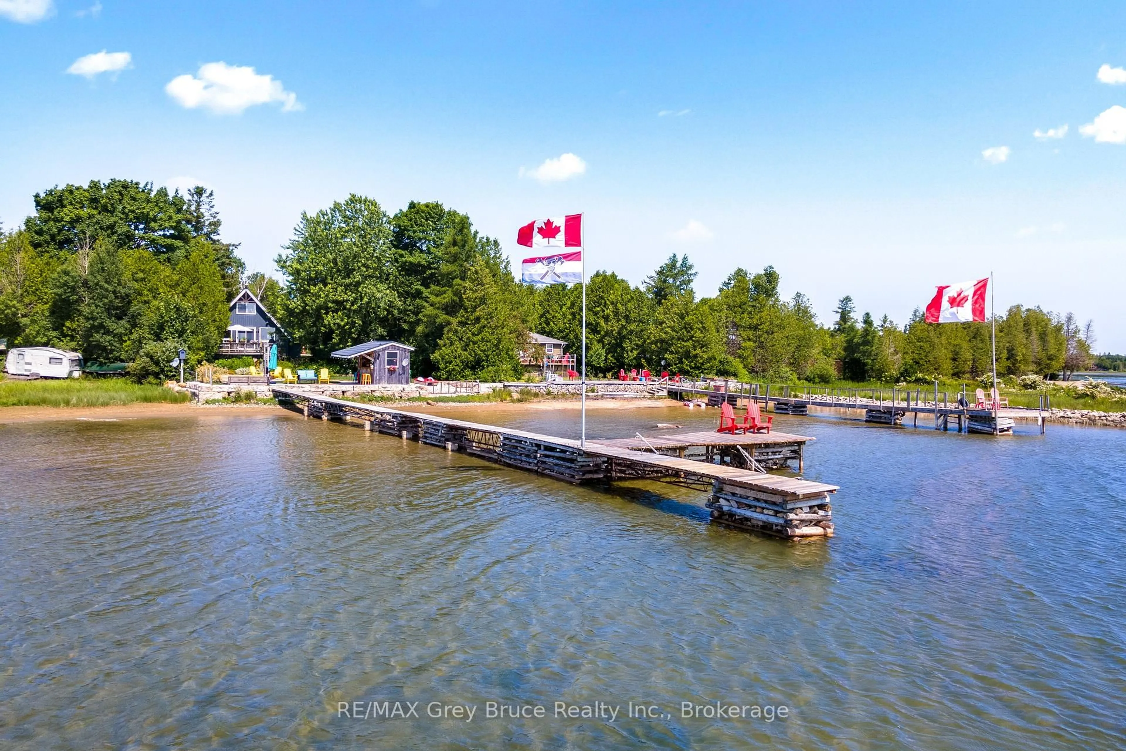 A pic from outside/outdoor area/front of a property/back of a property/a pic from drone, water/lake/river/ocean view for 40 Aberdeen Ave, Northern Bruce Peninsula Ontario N0H 2T0