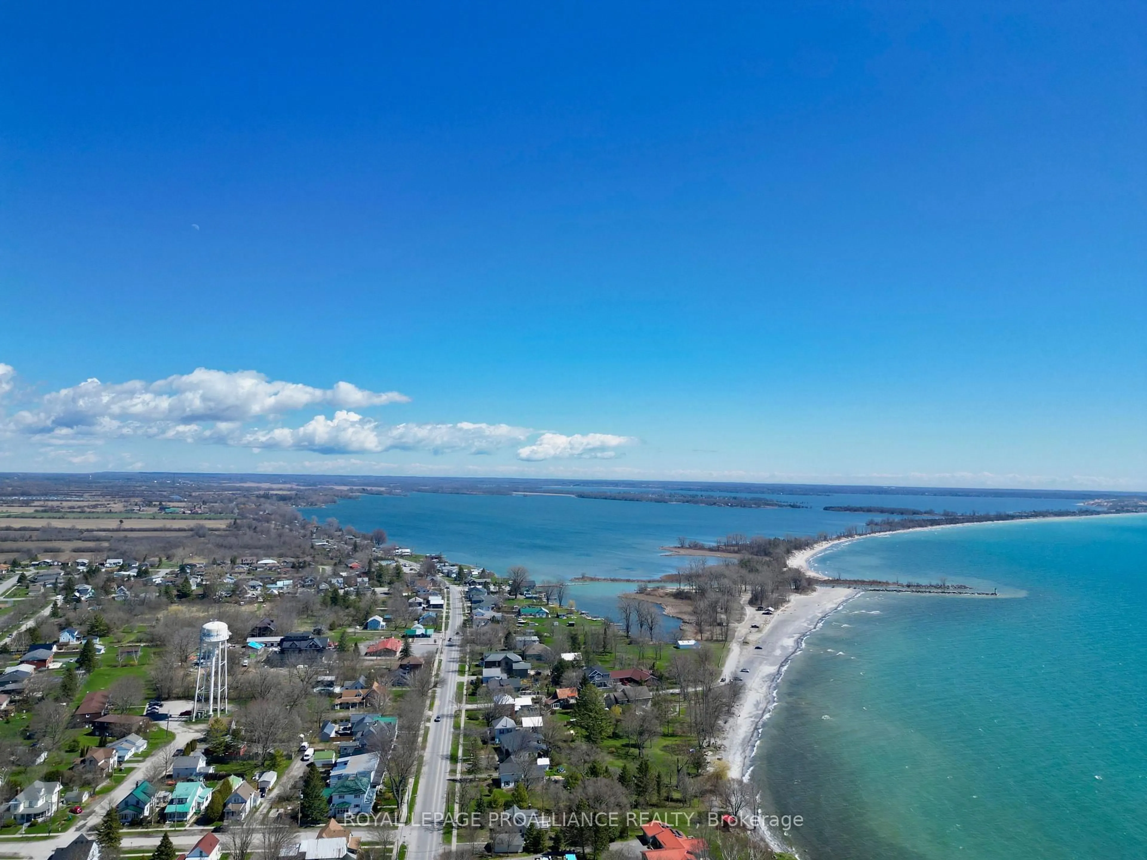 A pic from outside/outdoor area/front of a property/back of a property/a pic from drone, water/lake/river/ocean view for 13 Twelve Trees Crt, Prince Edward County Ontario K0K 3L0