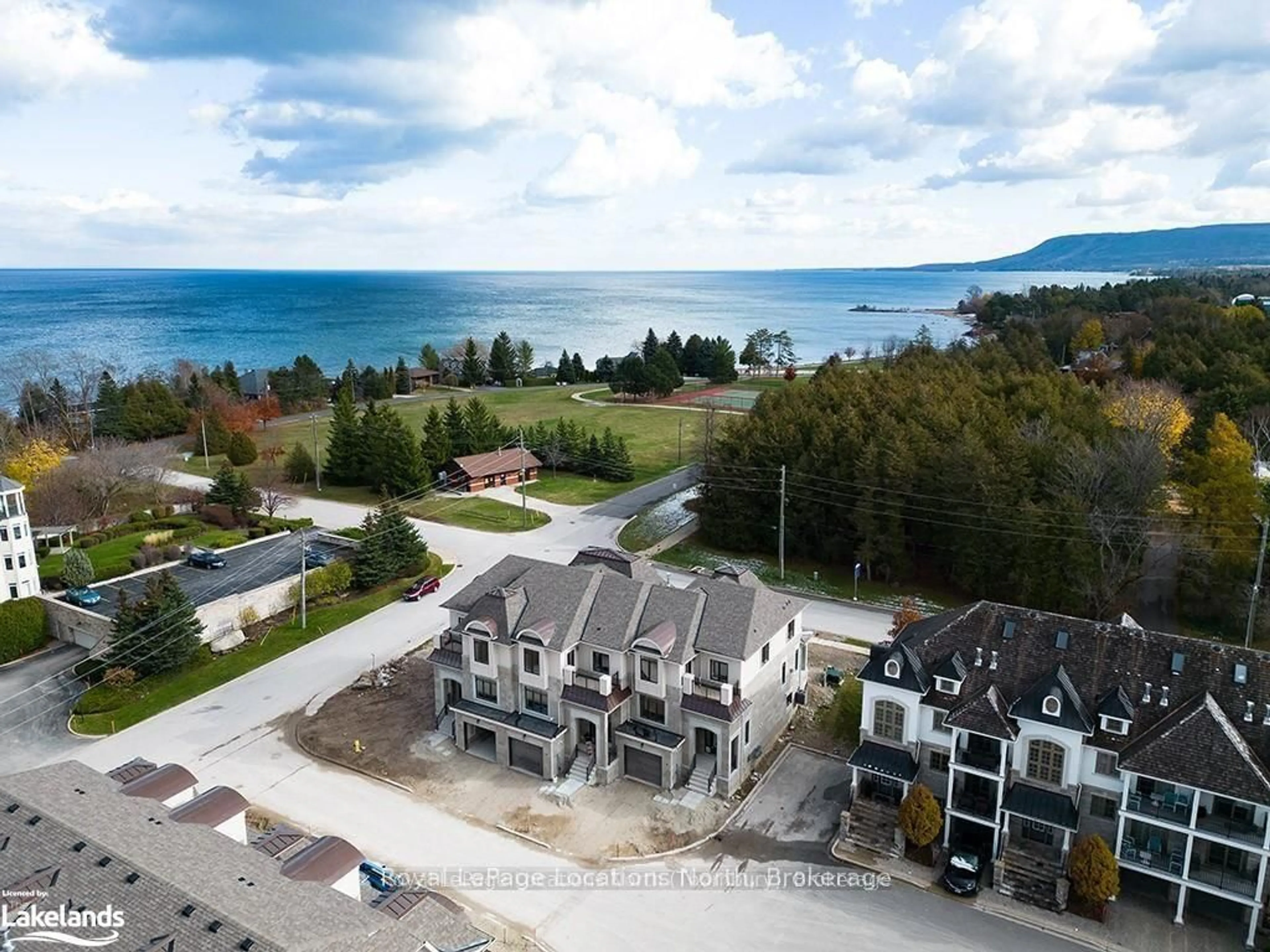 A pic from outside/outdoor area/front of a property/back of a property/a pic from drone, water/lake/river/ocean view for 11 Bay St #10, Blue Mountains Ontario N0H 2P0