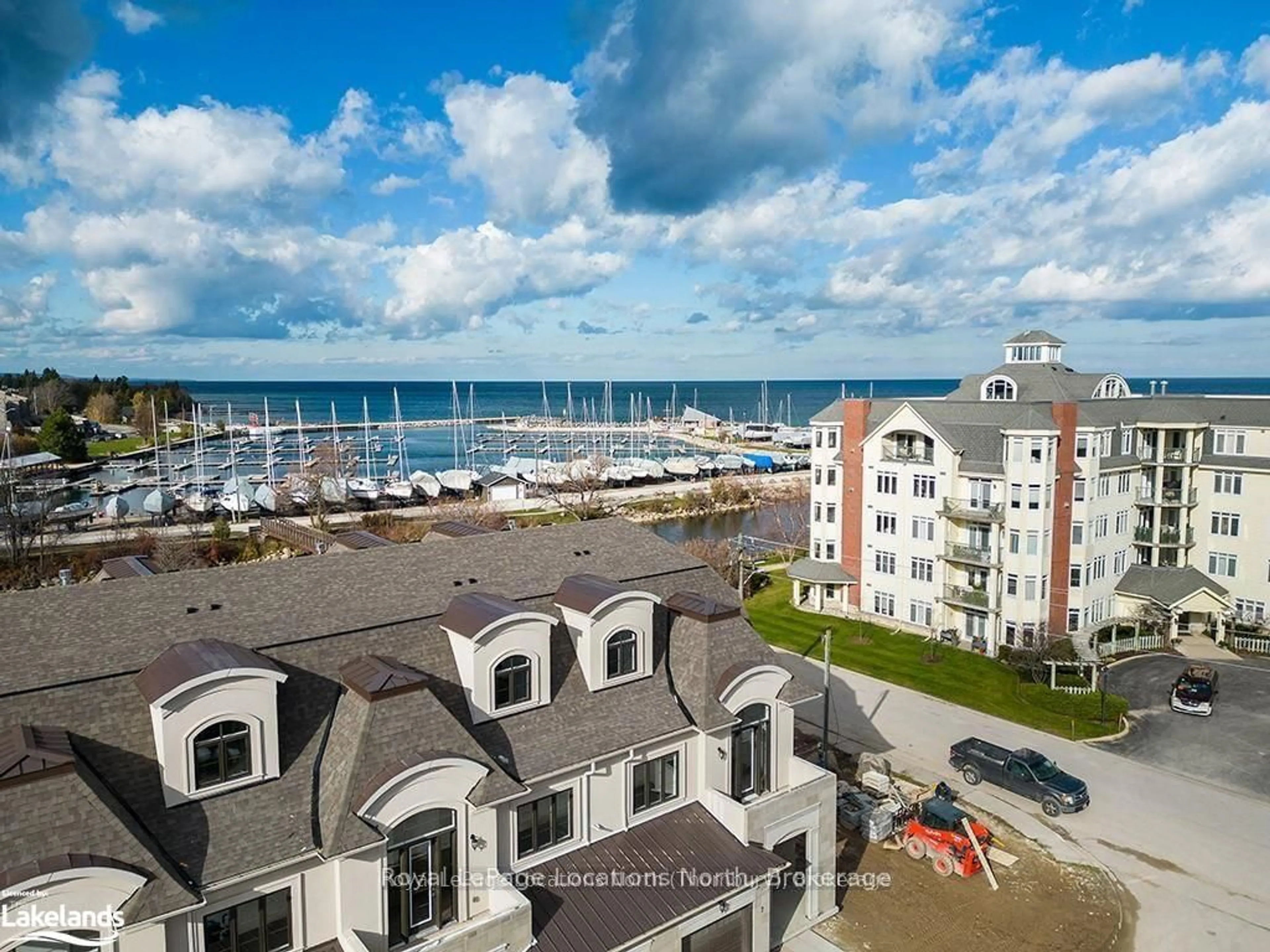 A pic from outside/outdoor area/front of a property/back of a property/a pic from drone, water/lake/river/ocean view for 11 Bay St #10, Blue Mountains Ontario N0H 2P0