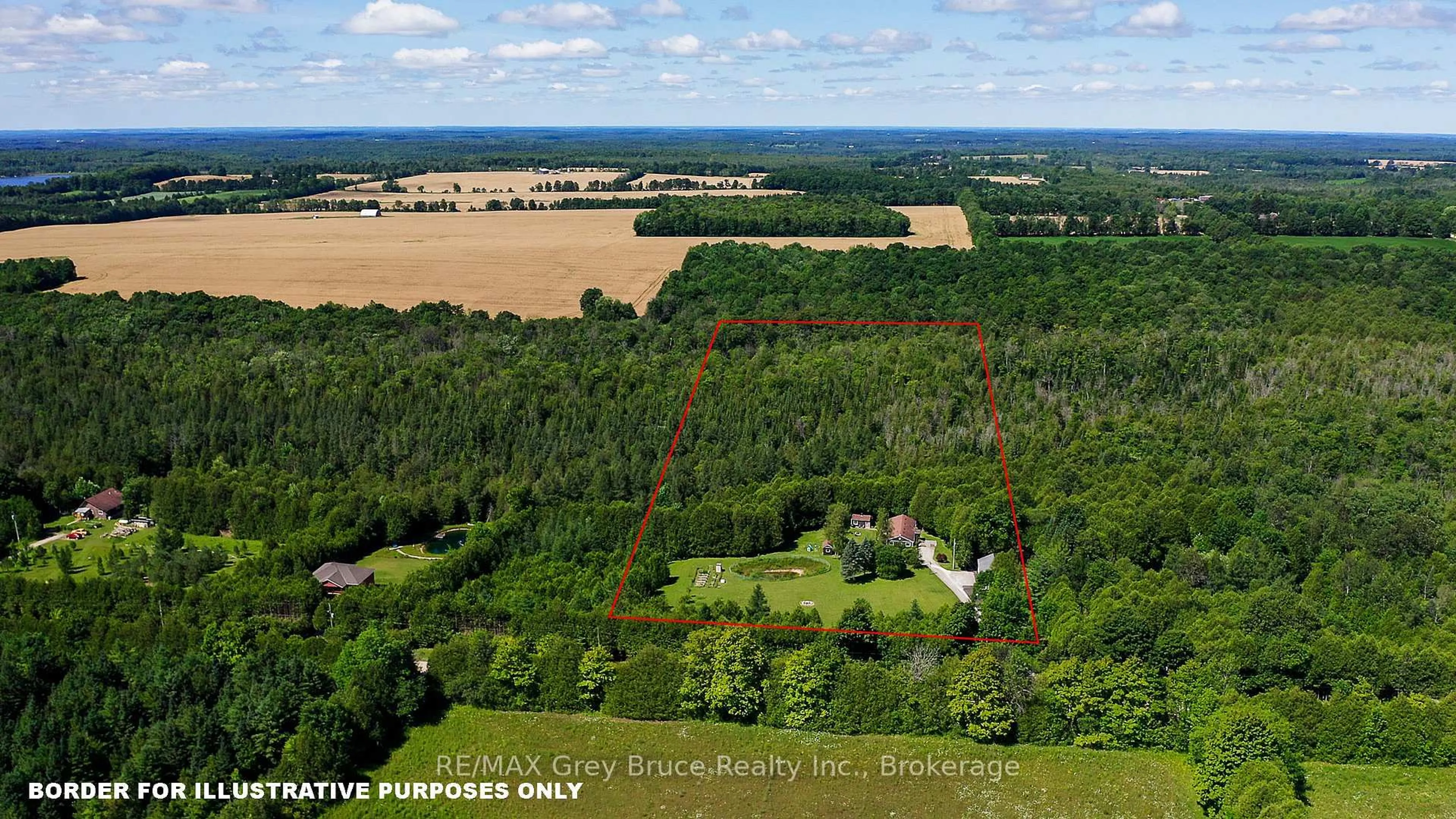 A pic from outside/outdoor area/front of a property/back of a property/a pic from drone, forest/trees view for 495204 Traverston Rd, West Grey Ontario N0C 1H0