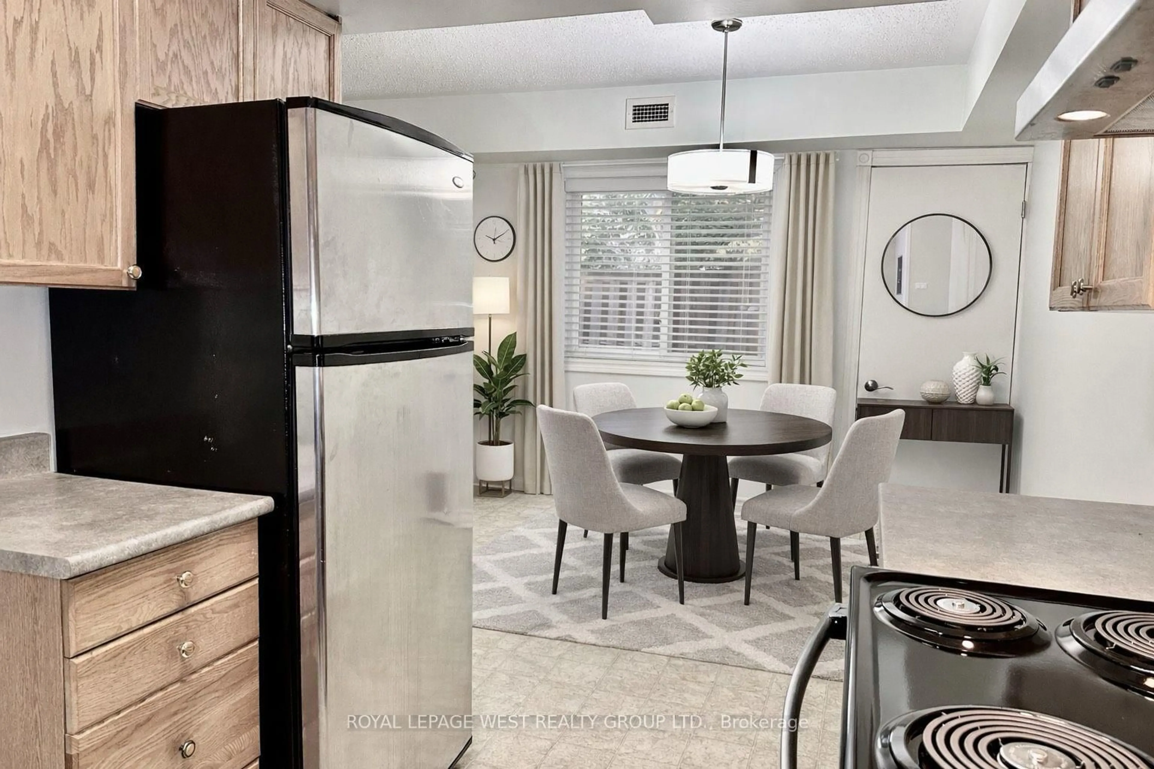 Open concept kitchen, ceramic/tile floor for 841 Battell St #107, Cobourg Ontario K9A 0B9