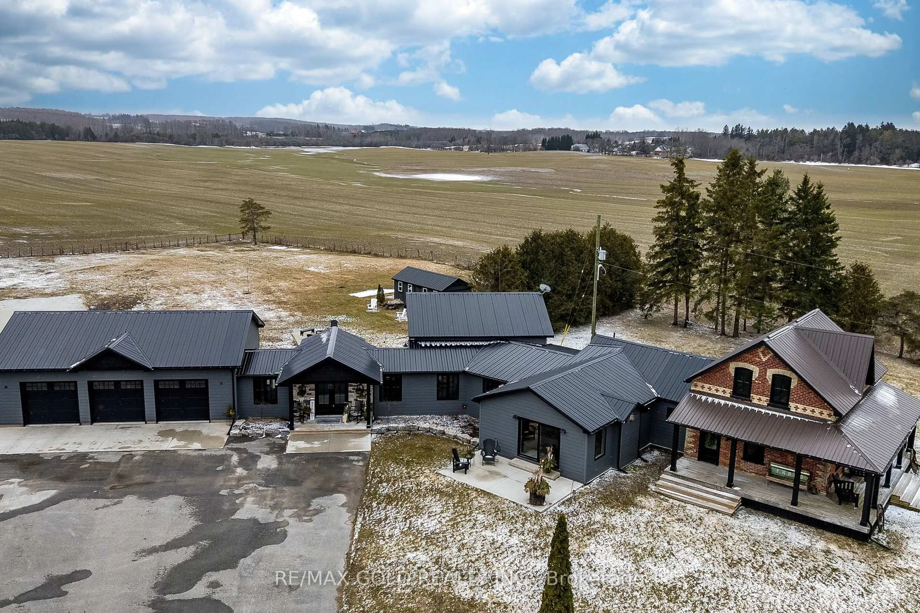 A pic from outside/outdoor area/front of a property/back of a property/a pic from drone, mountain view for 408082 Grey4 Rd, Grey Highlands Ontario N0C 1J0