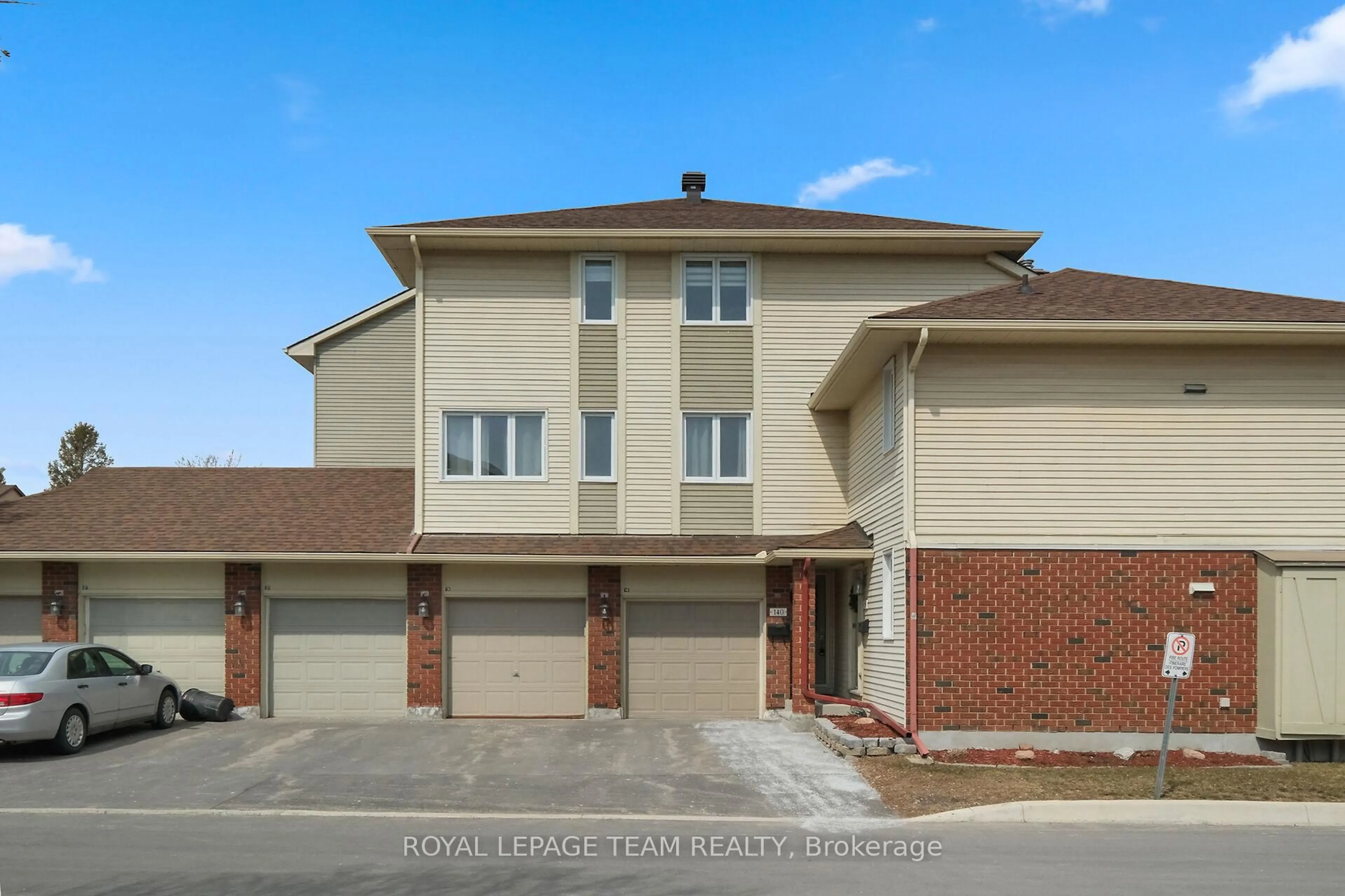 Home with brick exterior material, street for 140 Rushford Private #40, Ottawa Ontario K1T 3E2