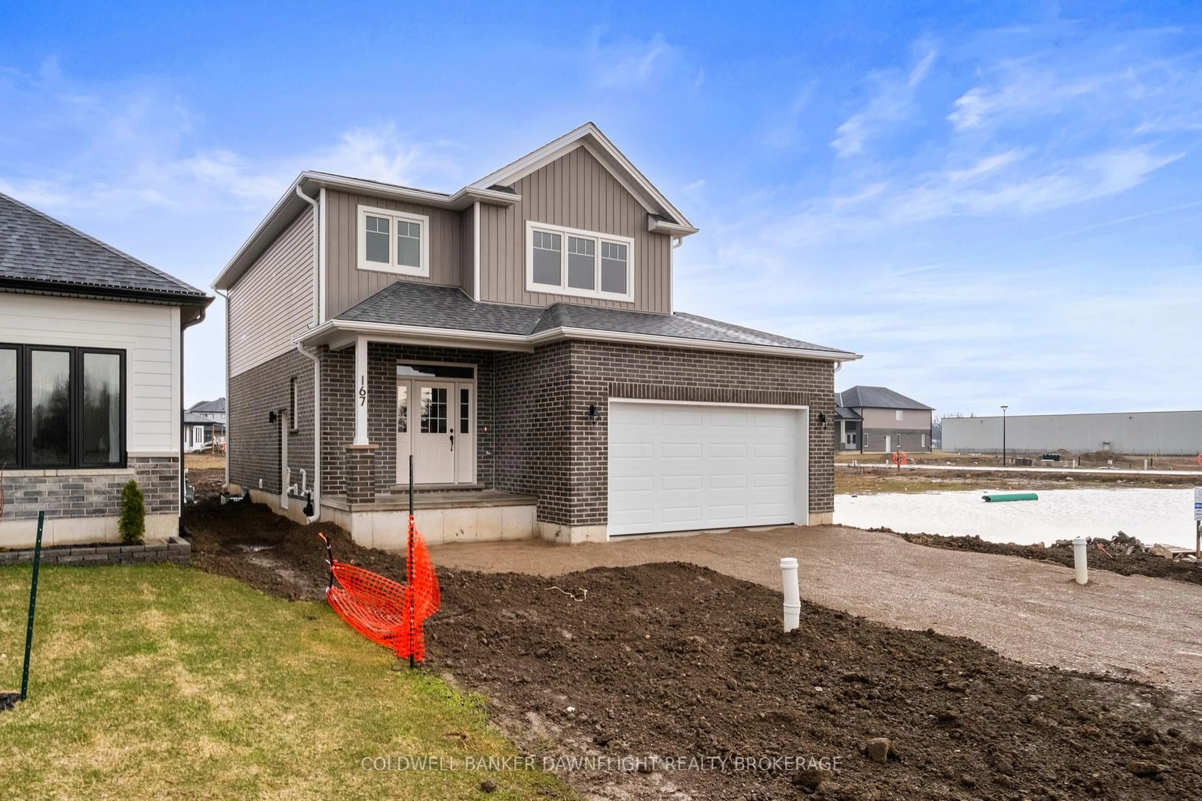 Home with vinyl exterior material, street for 167 Greene St, South Huron Ontario N0M 1S3