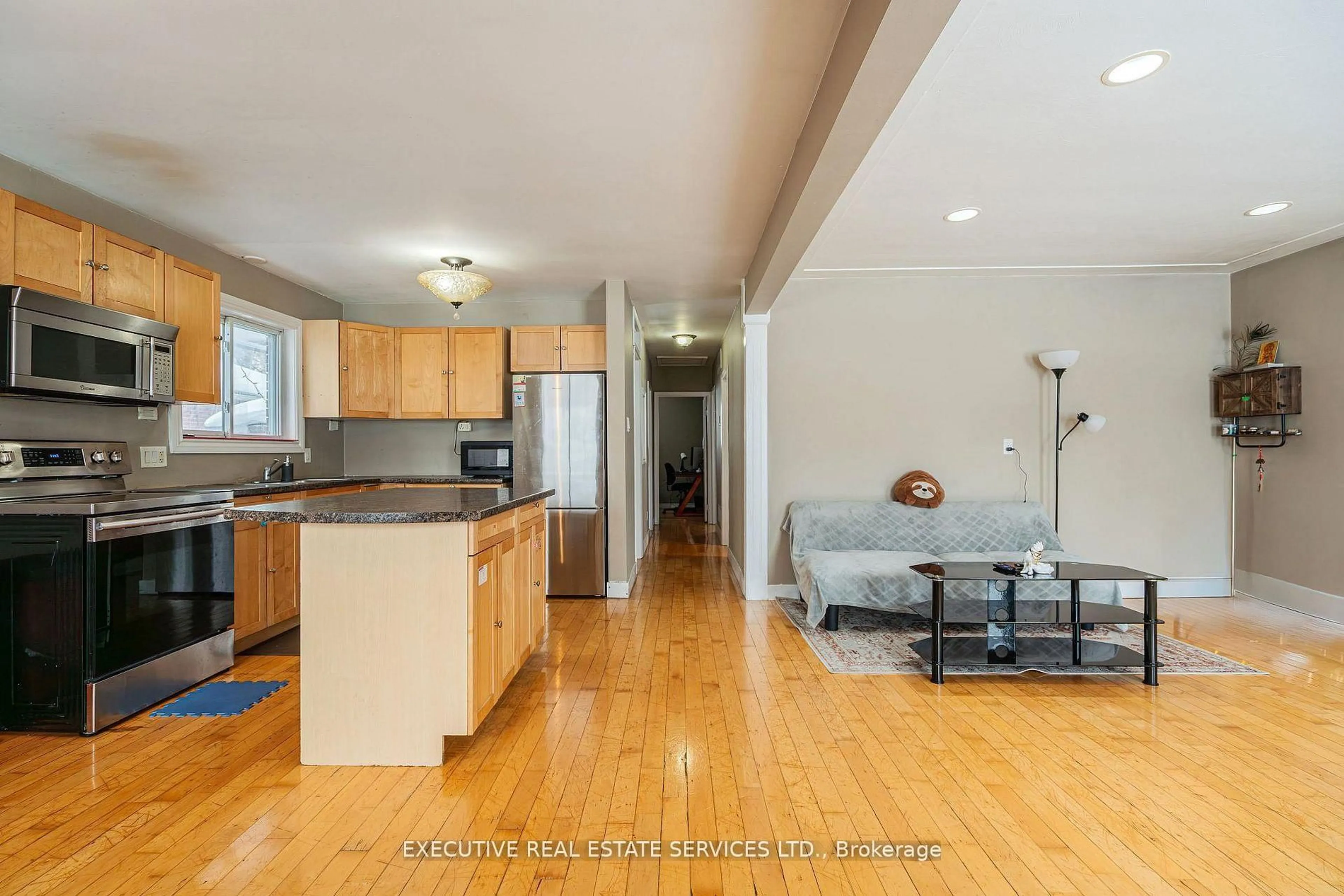 Open concept kitchen, wood/laminate floor for 268 Ross Ave, Kitchener Ontario N2A 1V6