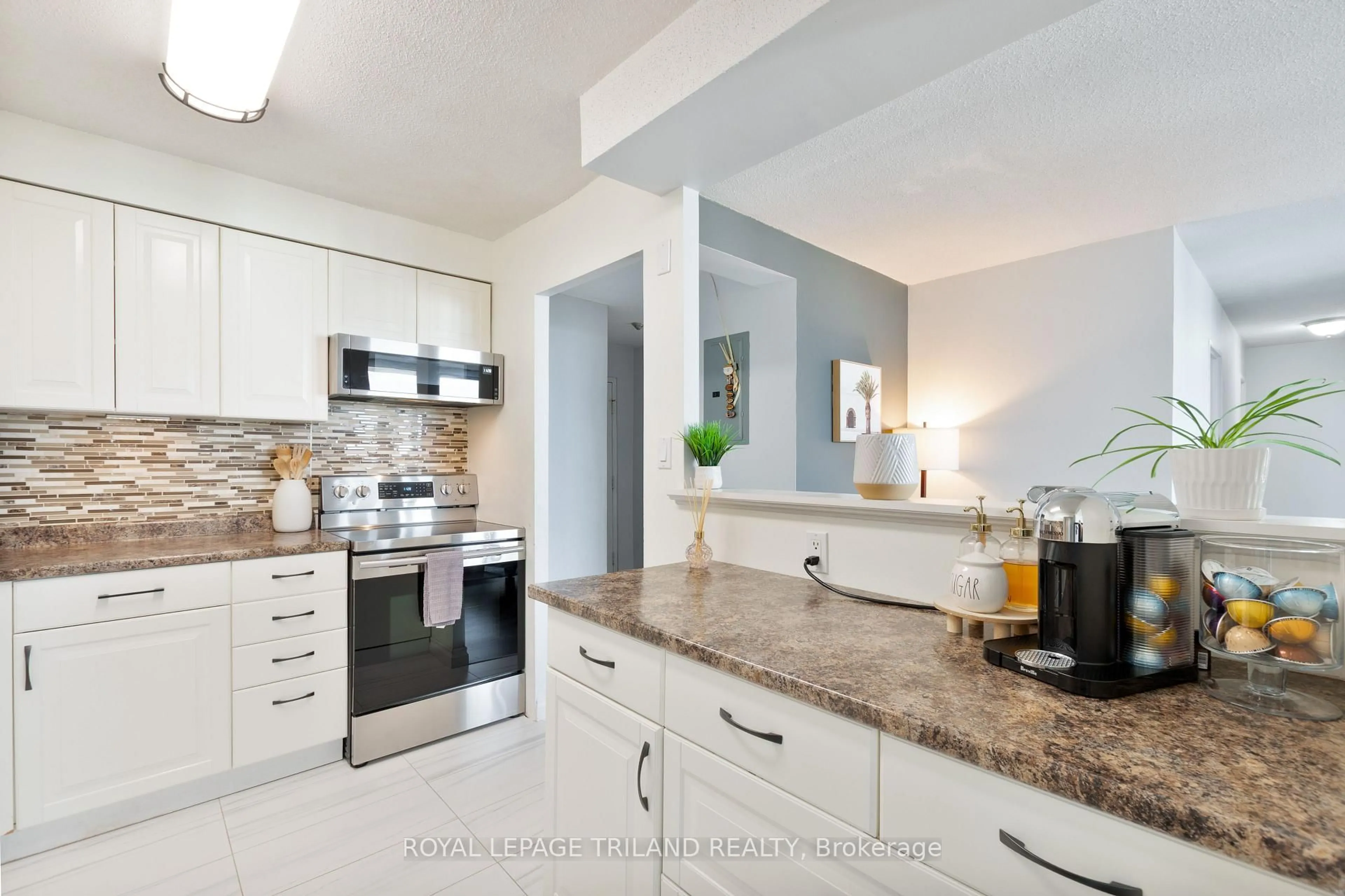 Open concept kitchen, ceramic/tile floor for 323 Colborne St #2703, London East Ontario N6B 3N8