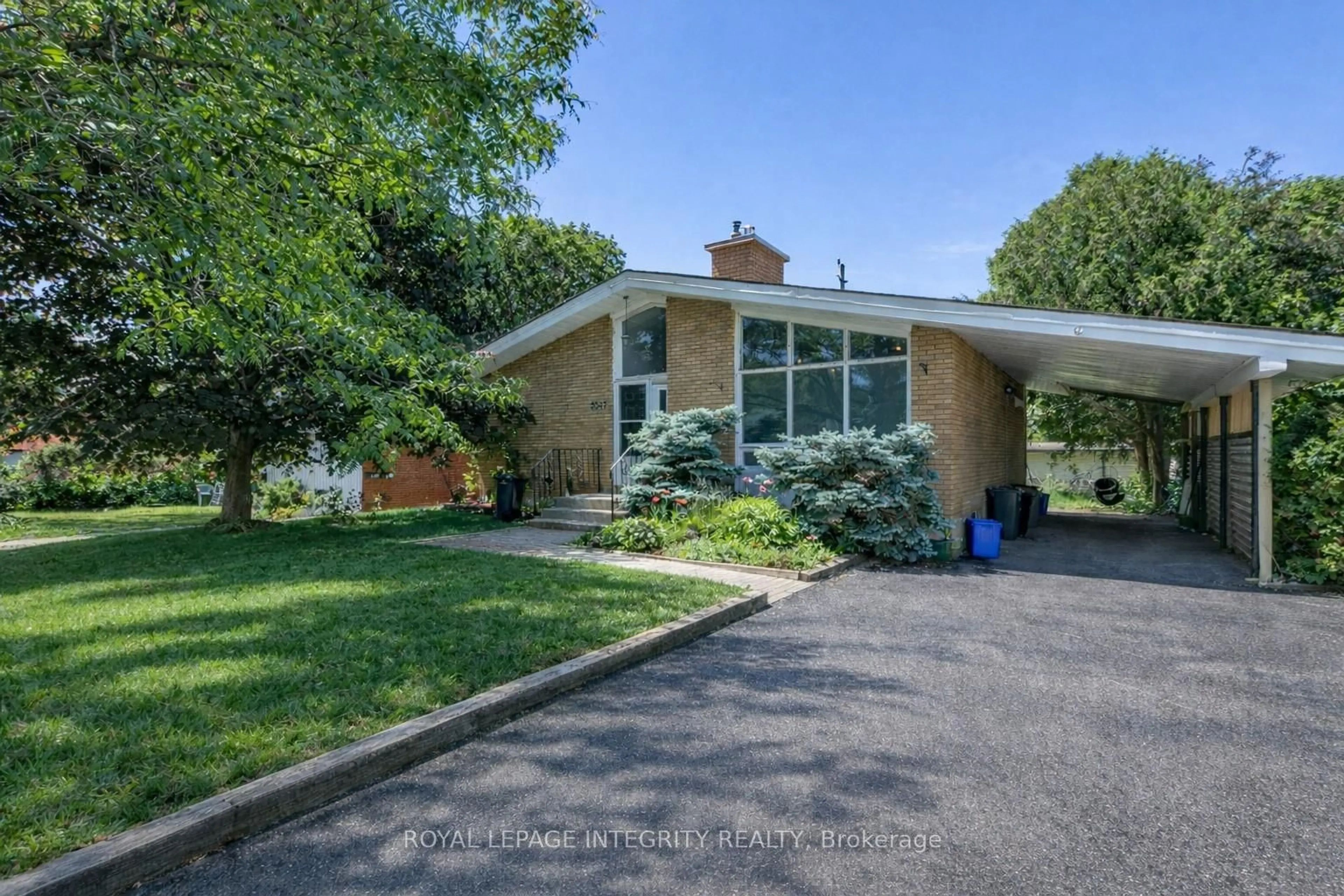 Home with brick exterior material, street for 2347 Baseline Rd, Ottawa Ontario K2C 0E2