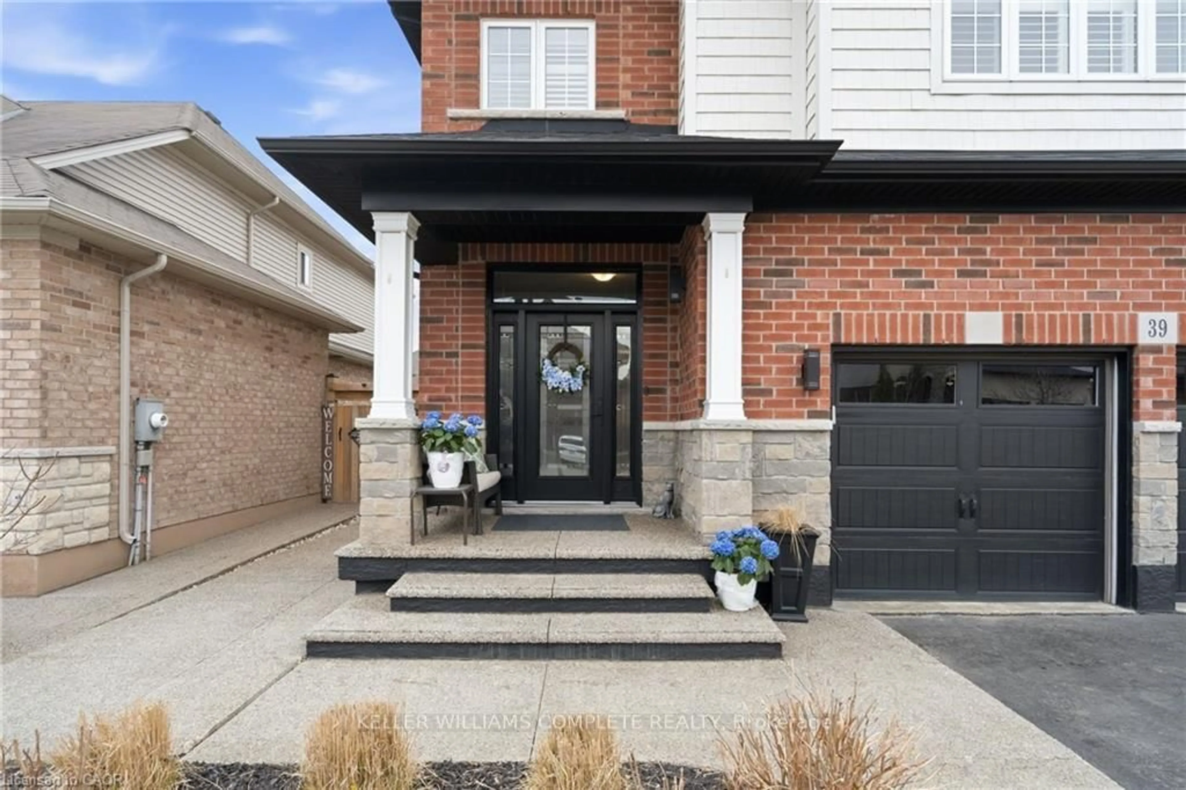 Home with brick exterior material, street for 39 TURI Dr, Hamilton Ontario L9B 0E2