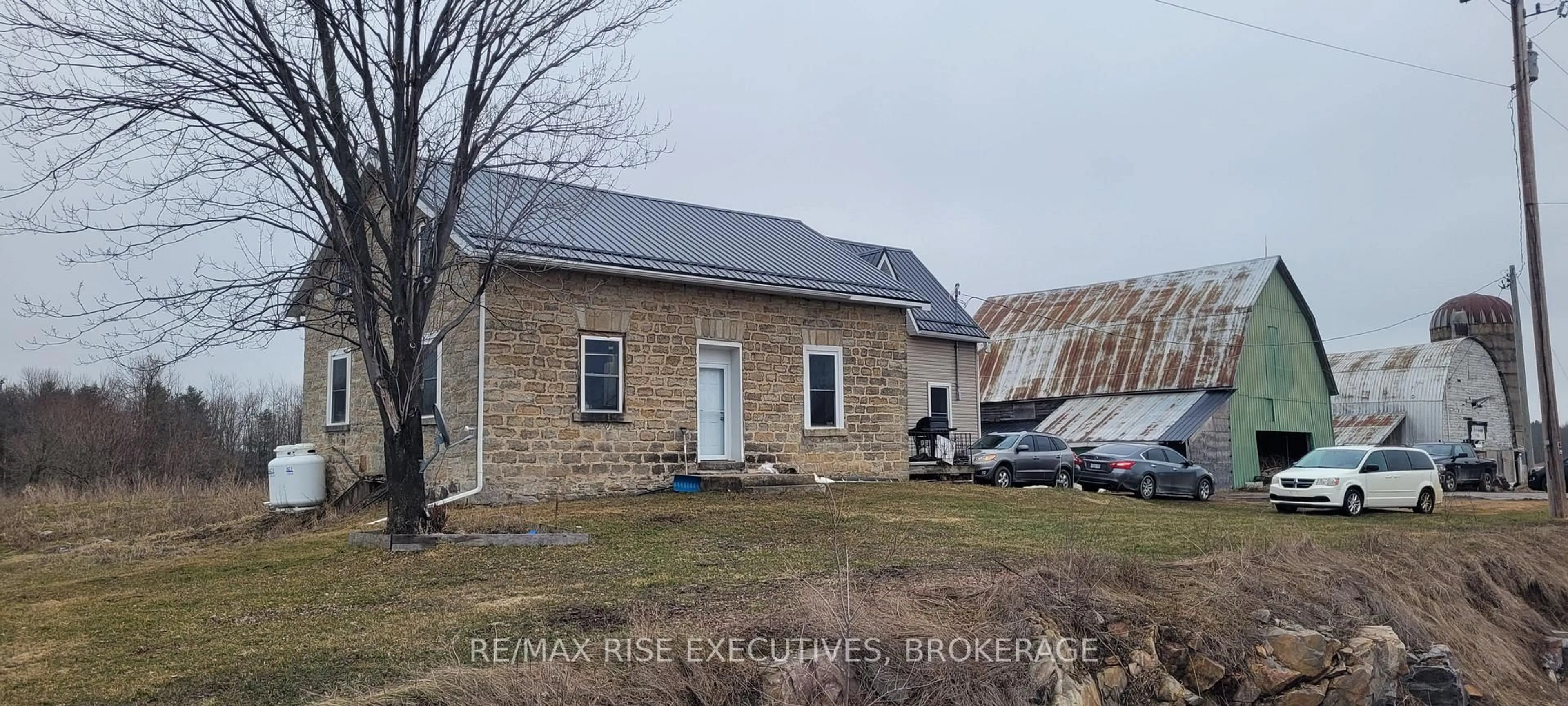 A pic from outside/outdoor area/front of a property/back of a property/a pic from drone, street for 1903 Highway 15, Rideau Lakes Ontario K0G 1E0
