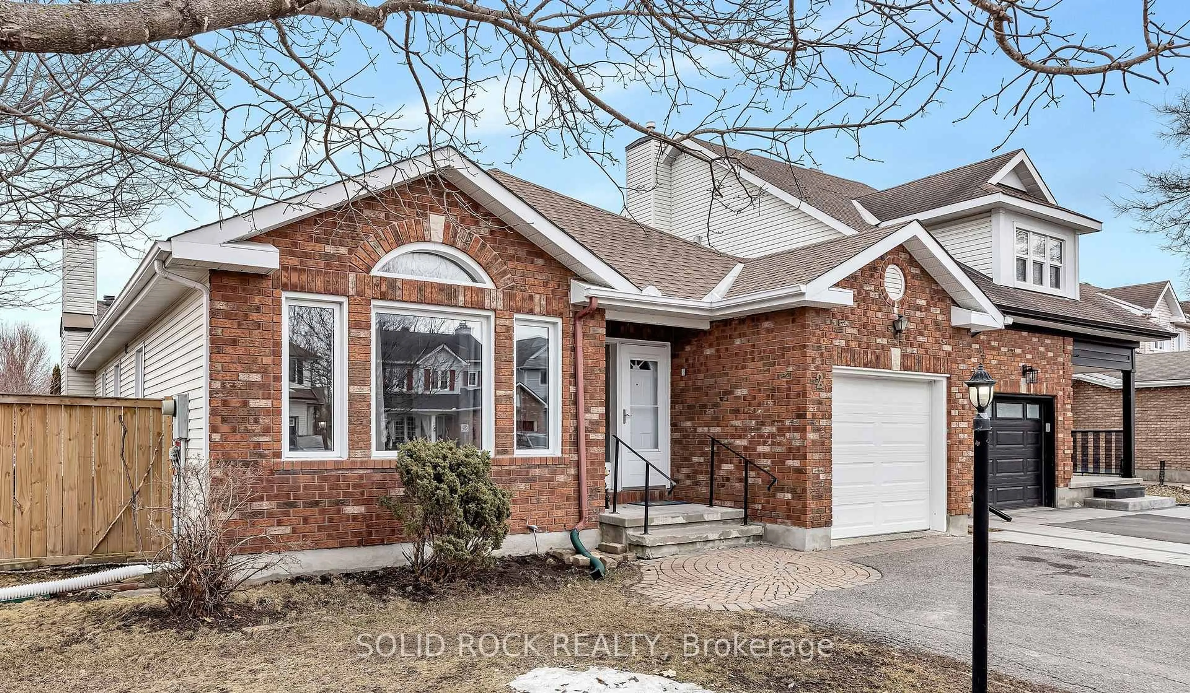Home with brick exterior material, street for 2 Newborough Cres, Ottawa Ontario K2G 6A2
