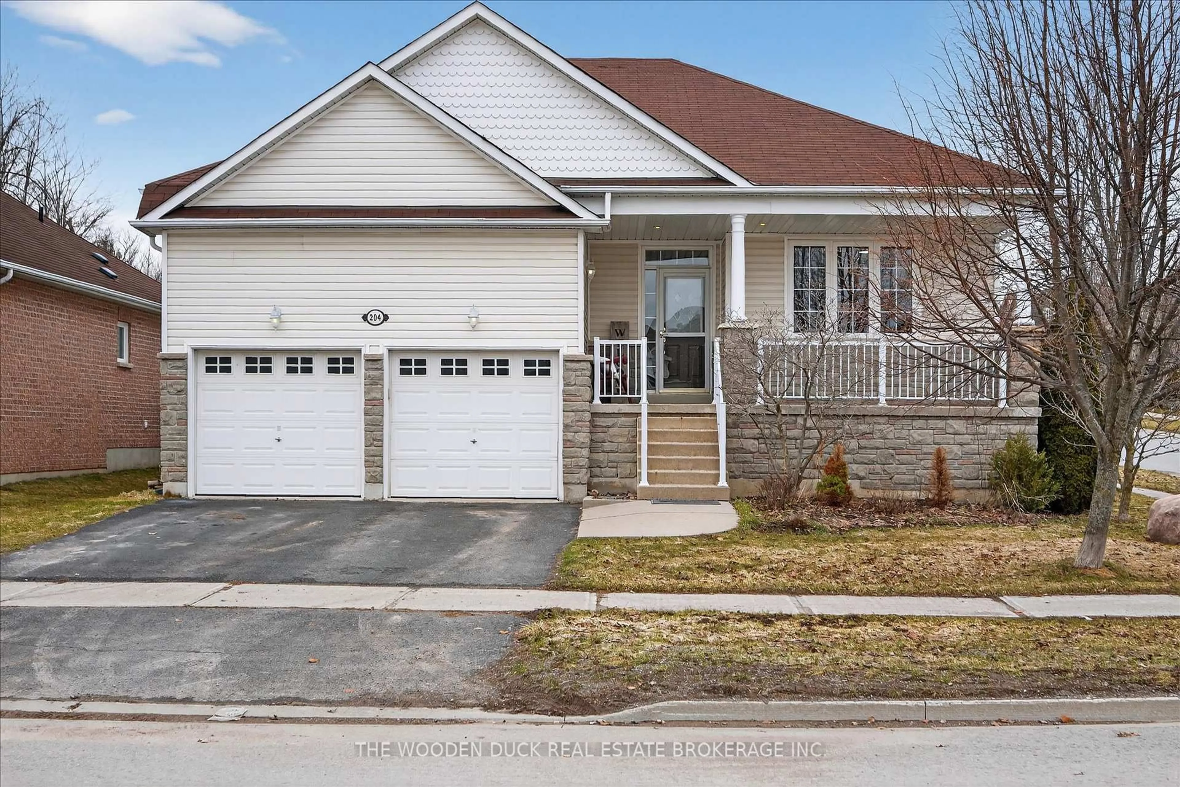 Home with vinyl exterior material, street for 204 Evans Dr, Peterborough Ontario K9H 7S6