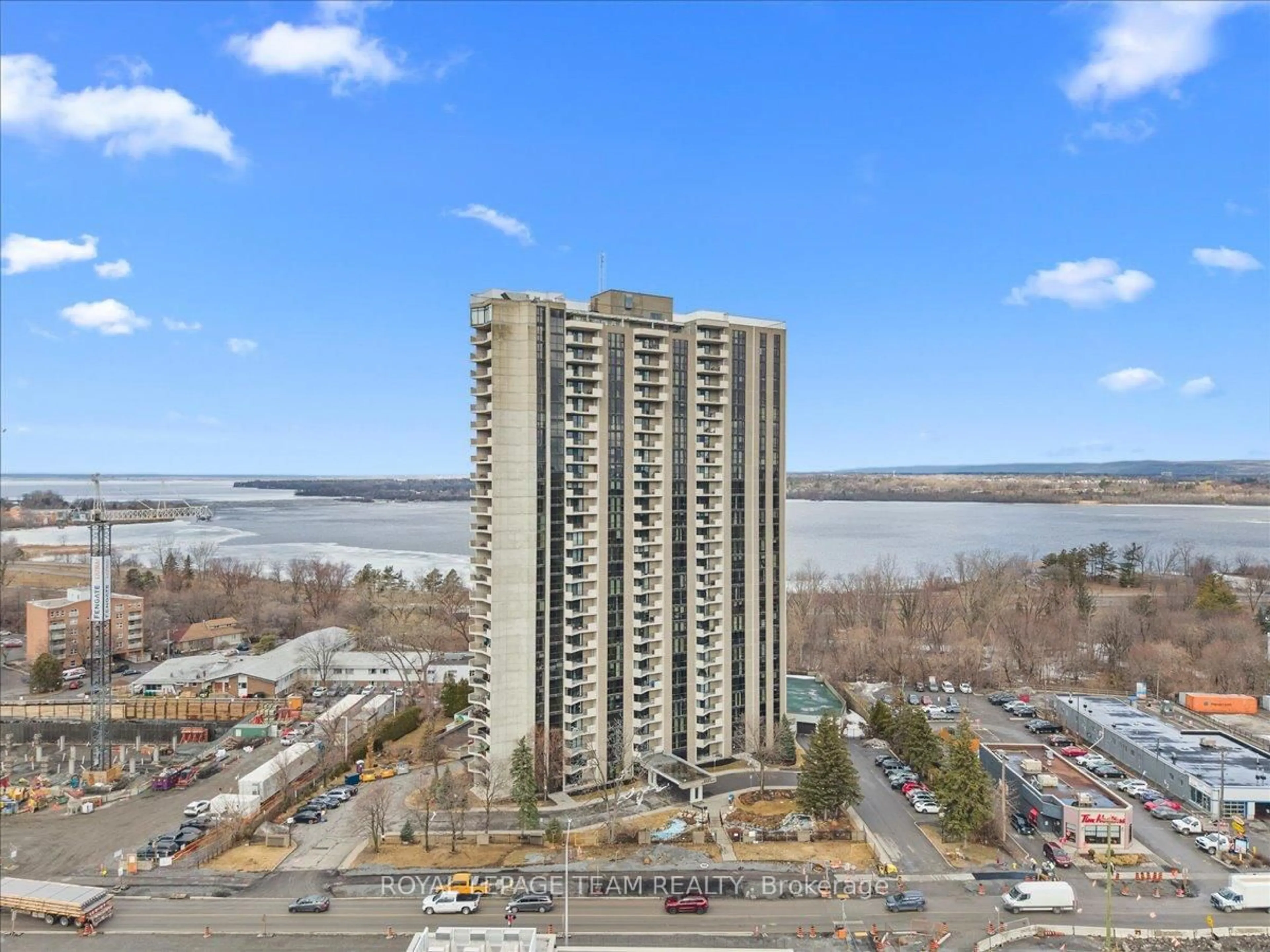 A pic from outside/outdoor area/front of a property/back of a property/a pic from drone, city buildings view from balcony for 1025 Richmond Rd #204, Ottawa Ontario K2B 8G8