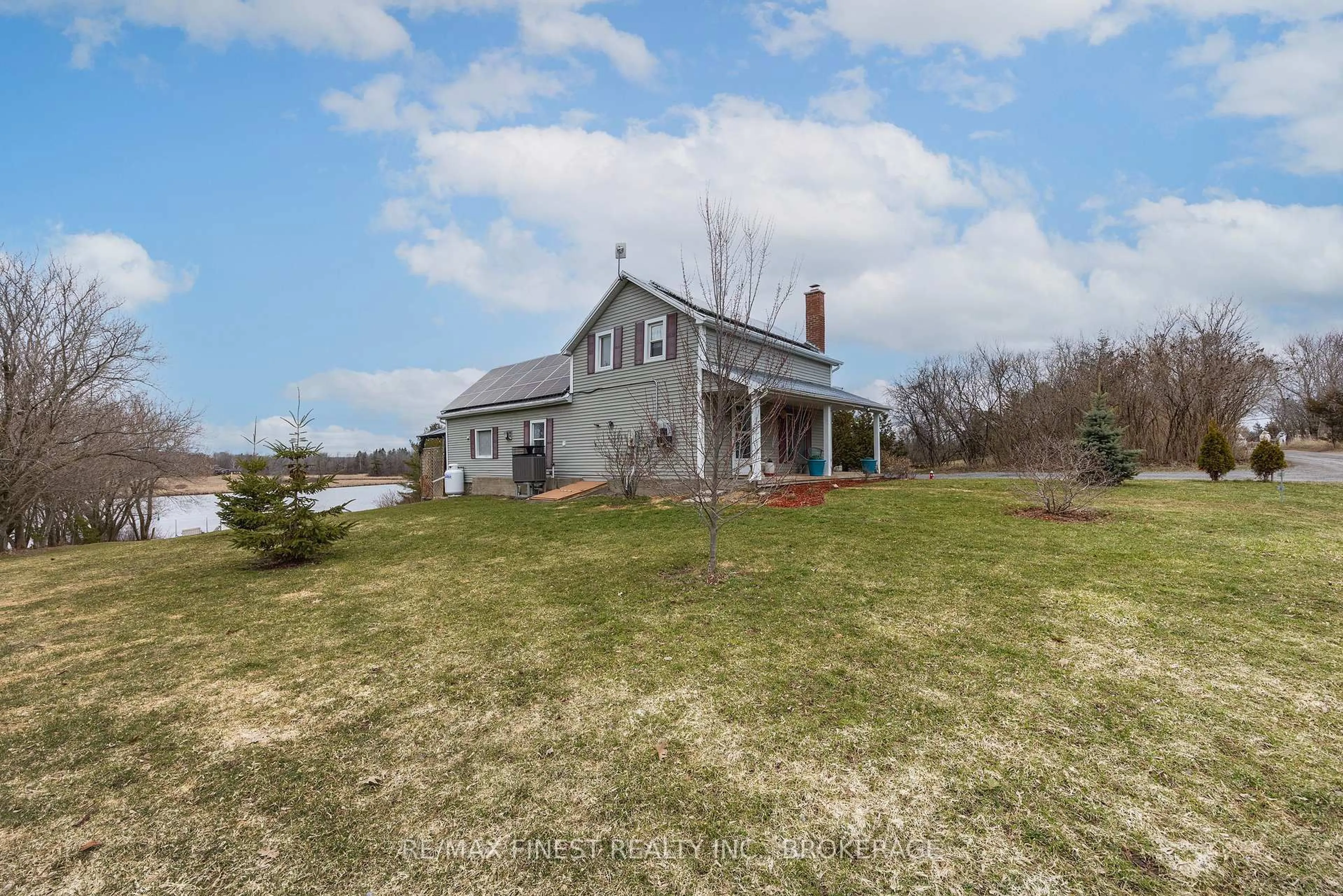 A pic from outside/outdoor area/front of a property/back of a property/a pic from drone, water/lake/river/ocean view for 731b County Road 9, Greater Napanee Ontario K7R 0E3