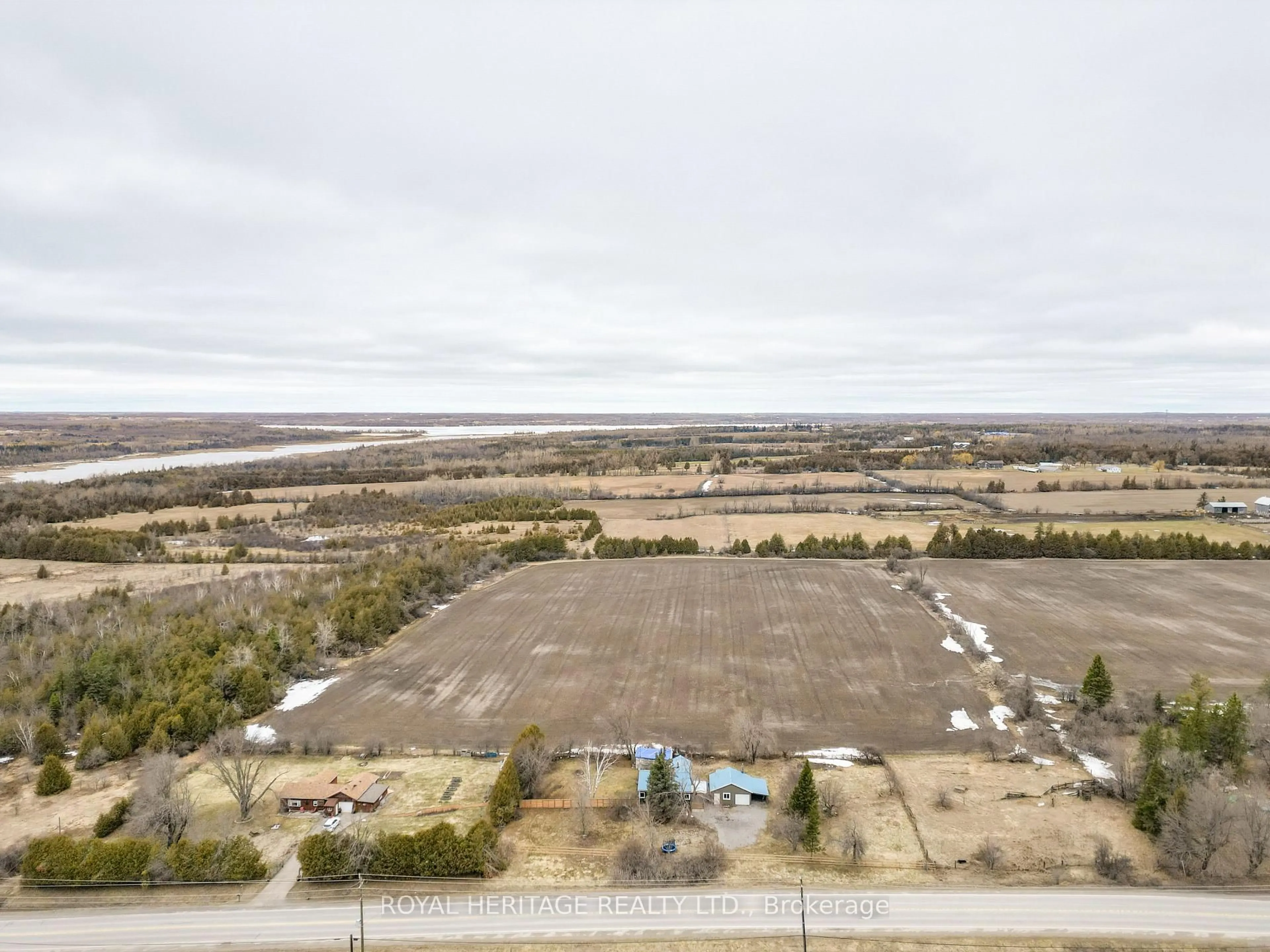 A pic from outside/outdoor area/front of a property/back of a property/a pic from drone, water/lake/river/ocean view for 2291 County Rd 36, Kawartha Lakes Ontario K0M 1L0