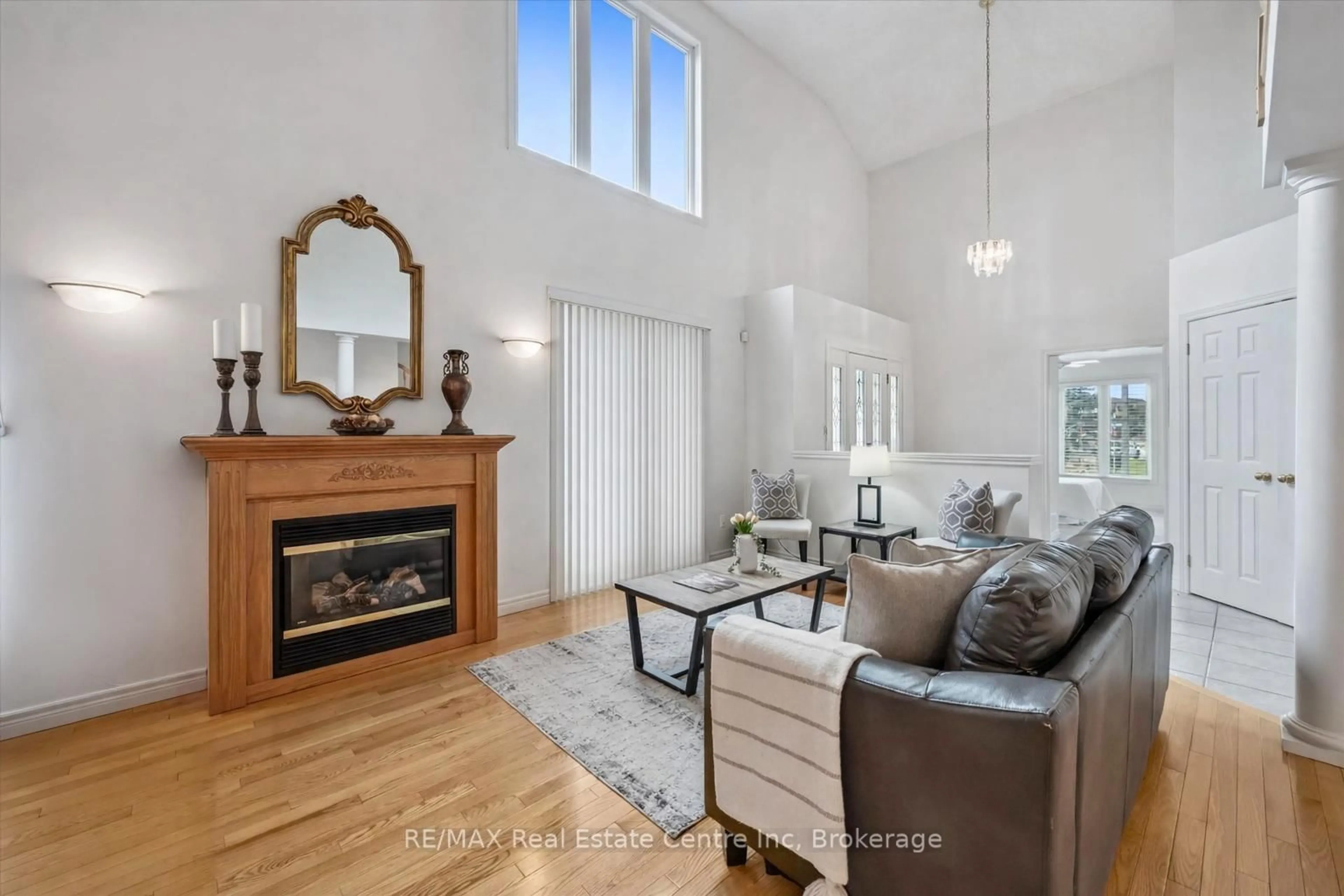 Living room with furniture, wood/laminate floor for 1 Thornton St, Guelph Ontario N1E 7B4