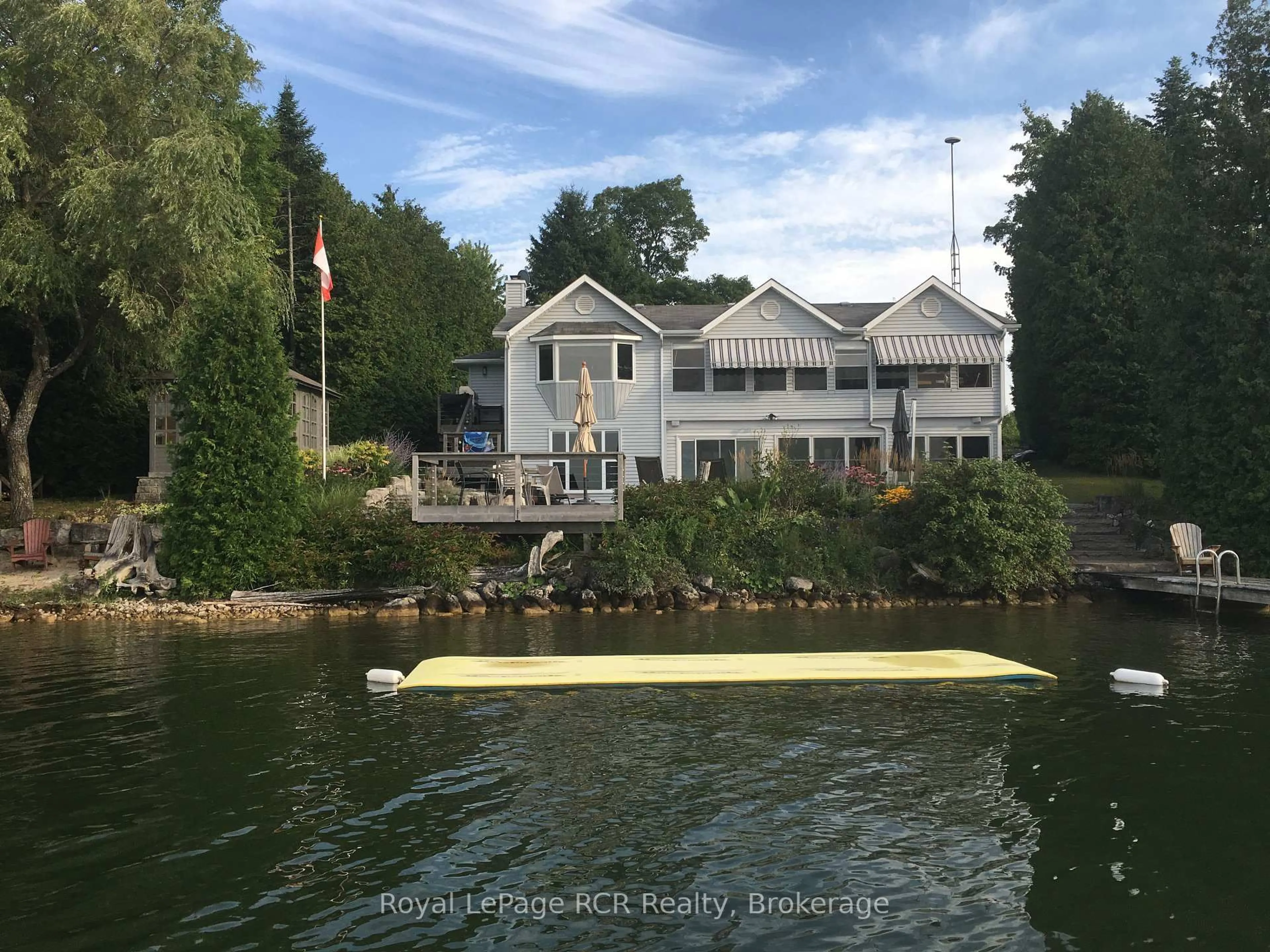 A pic from outside/outdoor area/front of a property/back of a property/a pic from drone, water/lake/river/ocean view for 126 Sunset Pt, Grey Highlands Ontario N0C 1E0