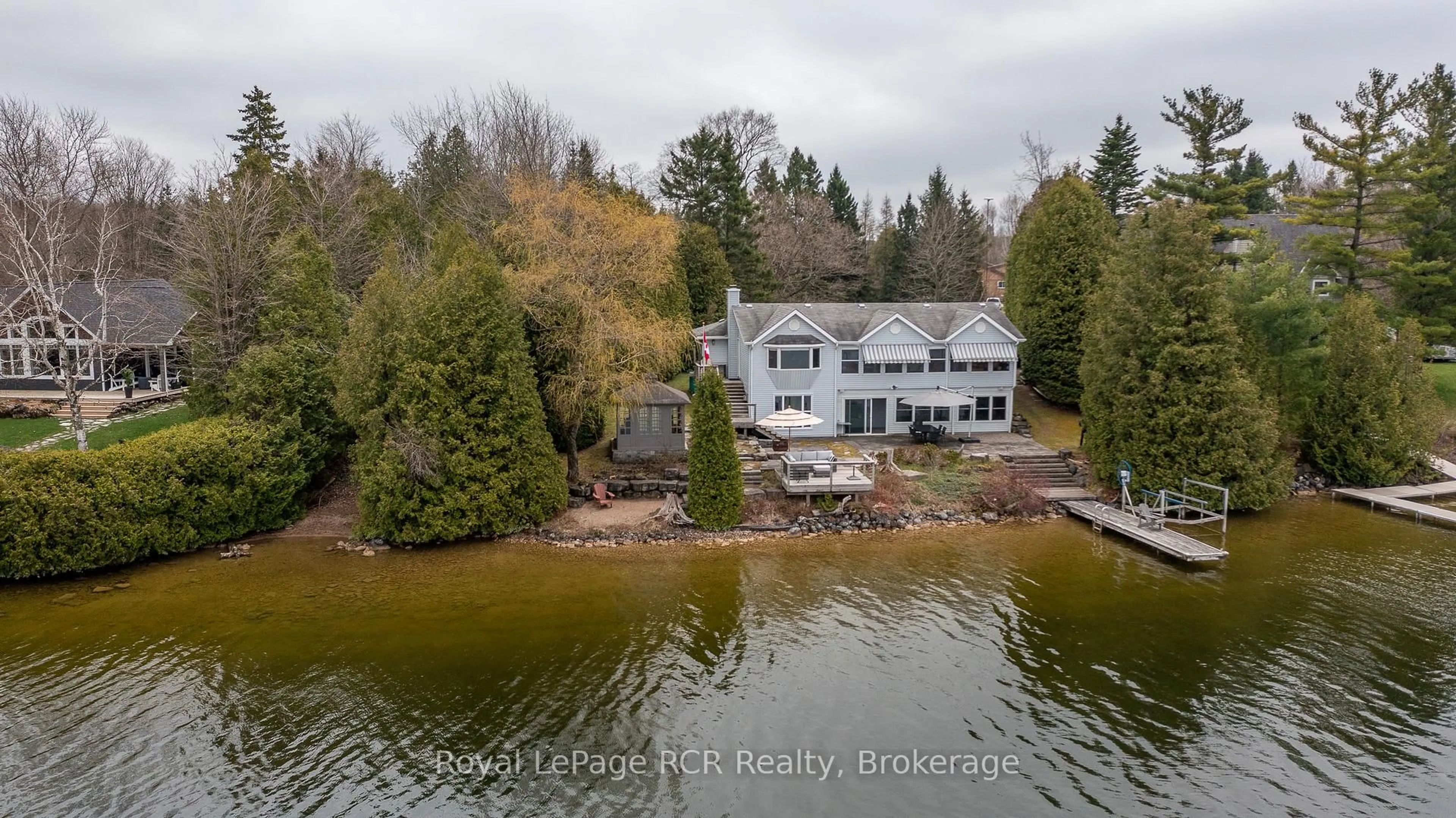 A pic from outside/outdoor area/front of a property/back of a property/a pic from drone, water/lake/river/ocean view for 126 Sunset Pt, Grey Highlands Ontario N0C 1E0