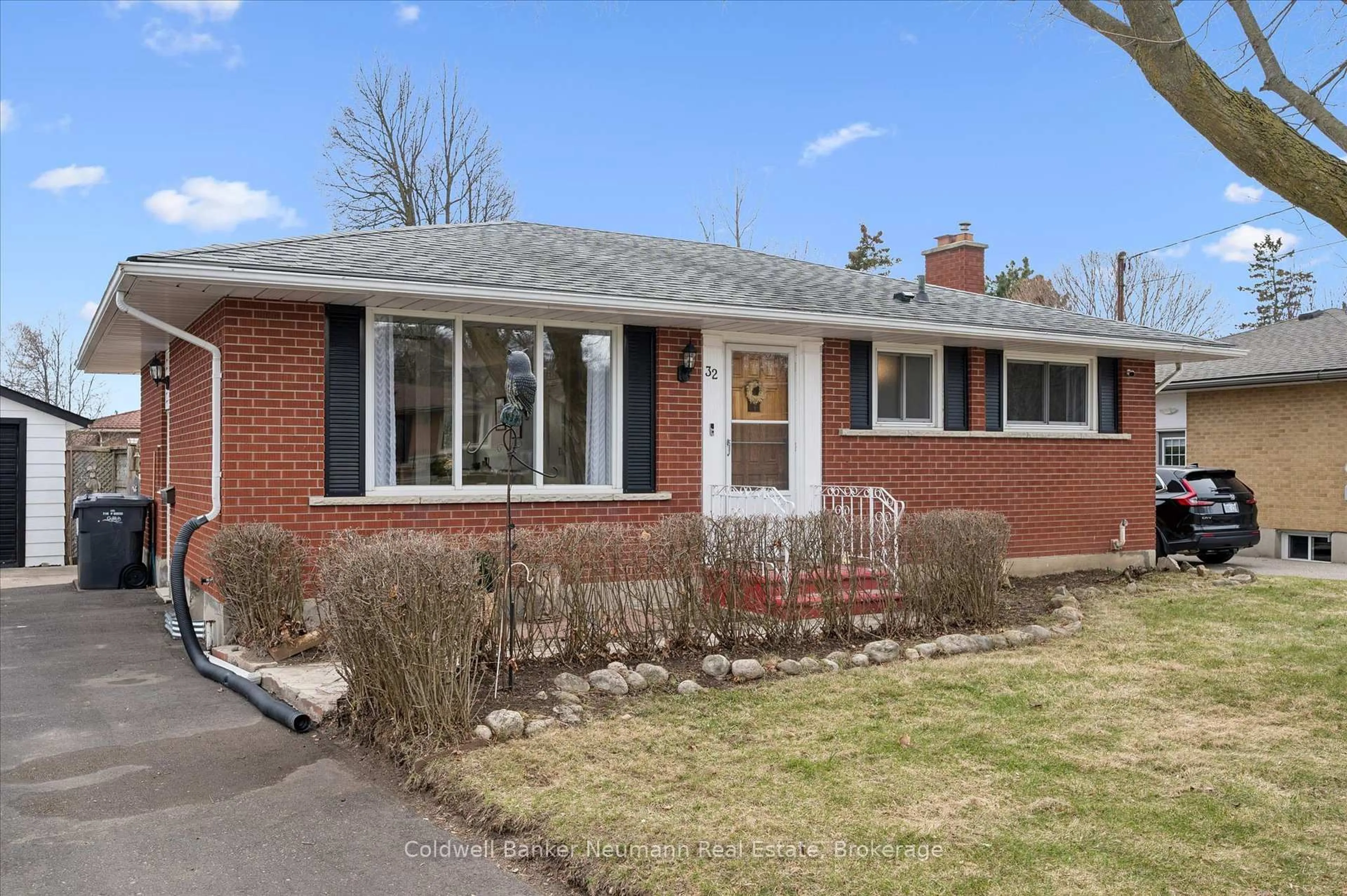 Home with brick exterior material, street for 32 Sleeman Ave, Guelph Ontario N1H 6E9