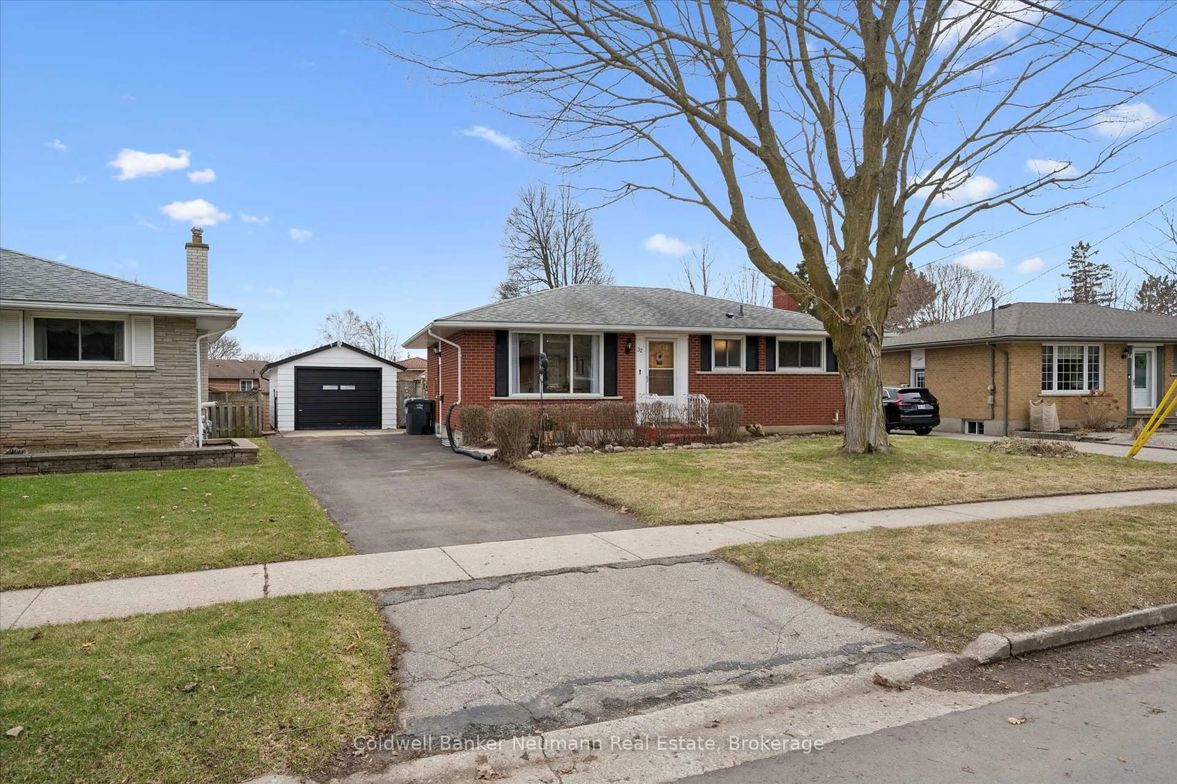 Home with brick exterior material, street for 32 Sleeman Ave, Guelph Ontario N1H 6E9