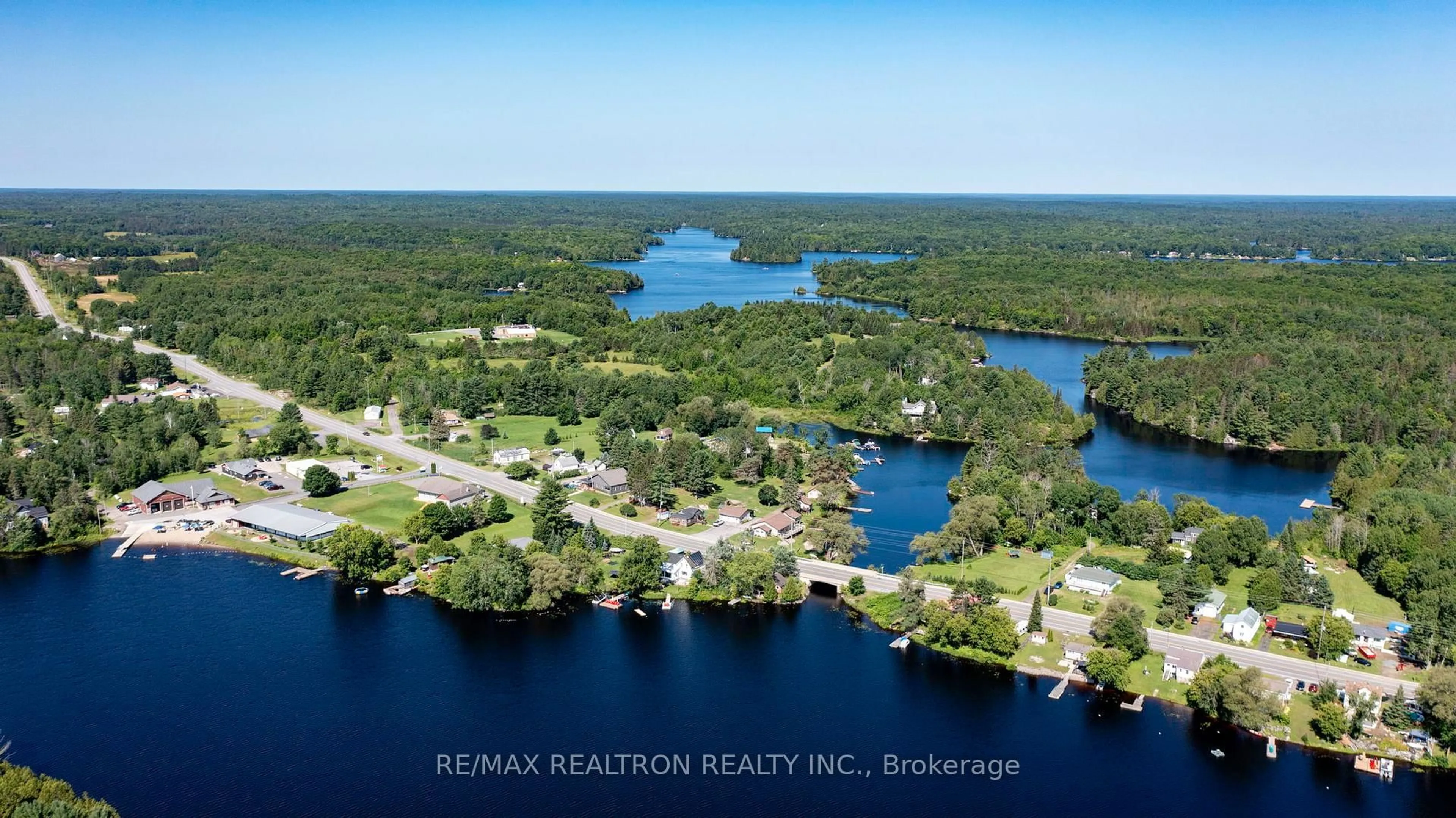 A pic from outside/outdoor area/front of a property/back of a property/a pic from drone, water/lake/river/ocean view for 2250 Hwy 124, Whitestone Ontario P0A 1G0