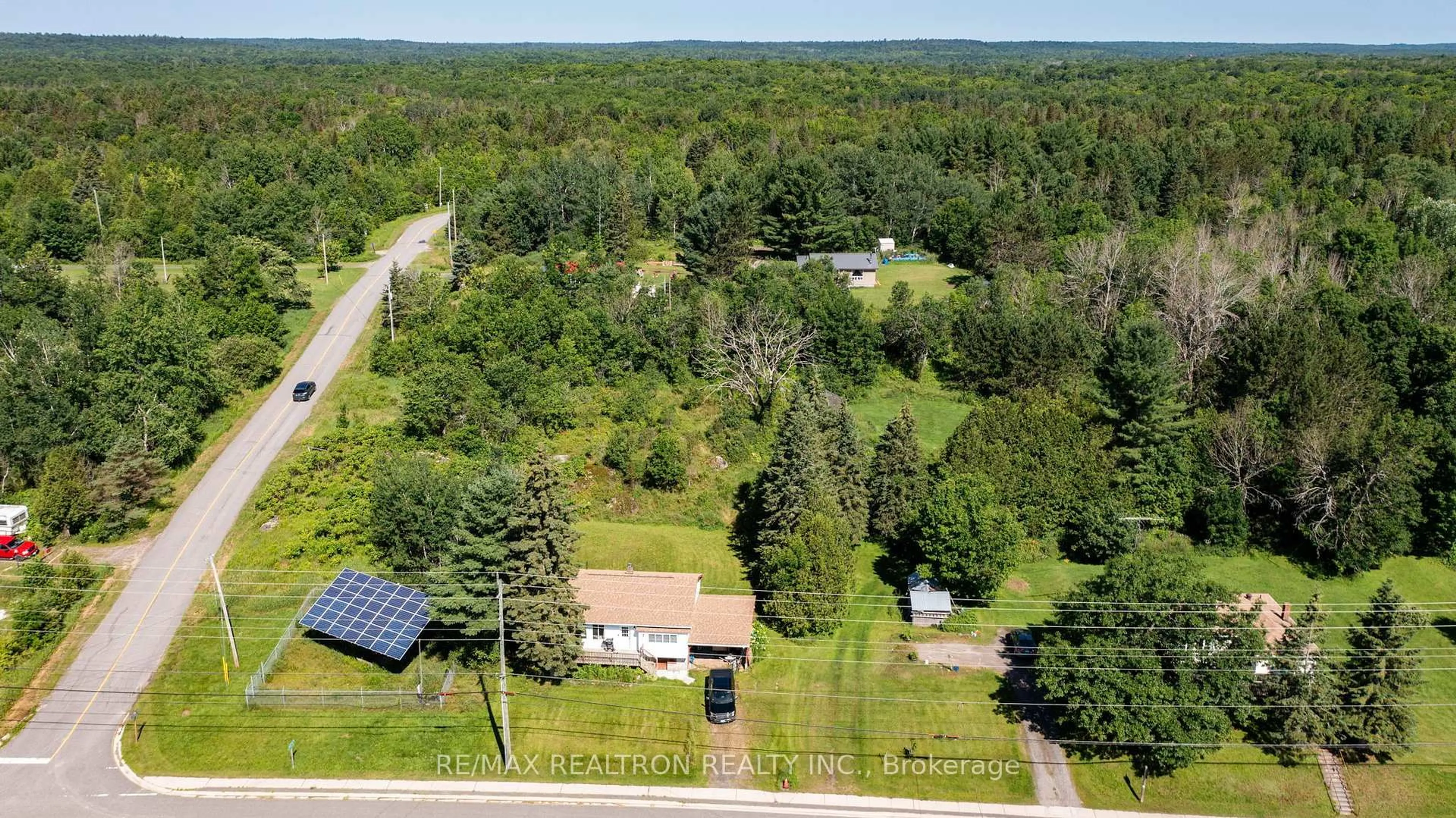 A pic from outside/outdoor area/front of a property/back of a property/a pic from drone, forest/trees view for 2250 Hwy 124, Whitestone Ontario P0A 1G0