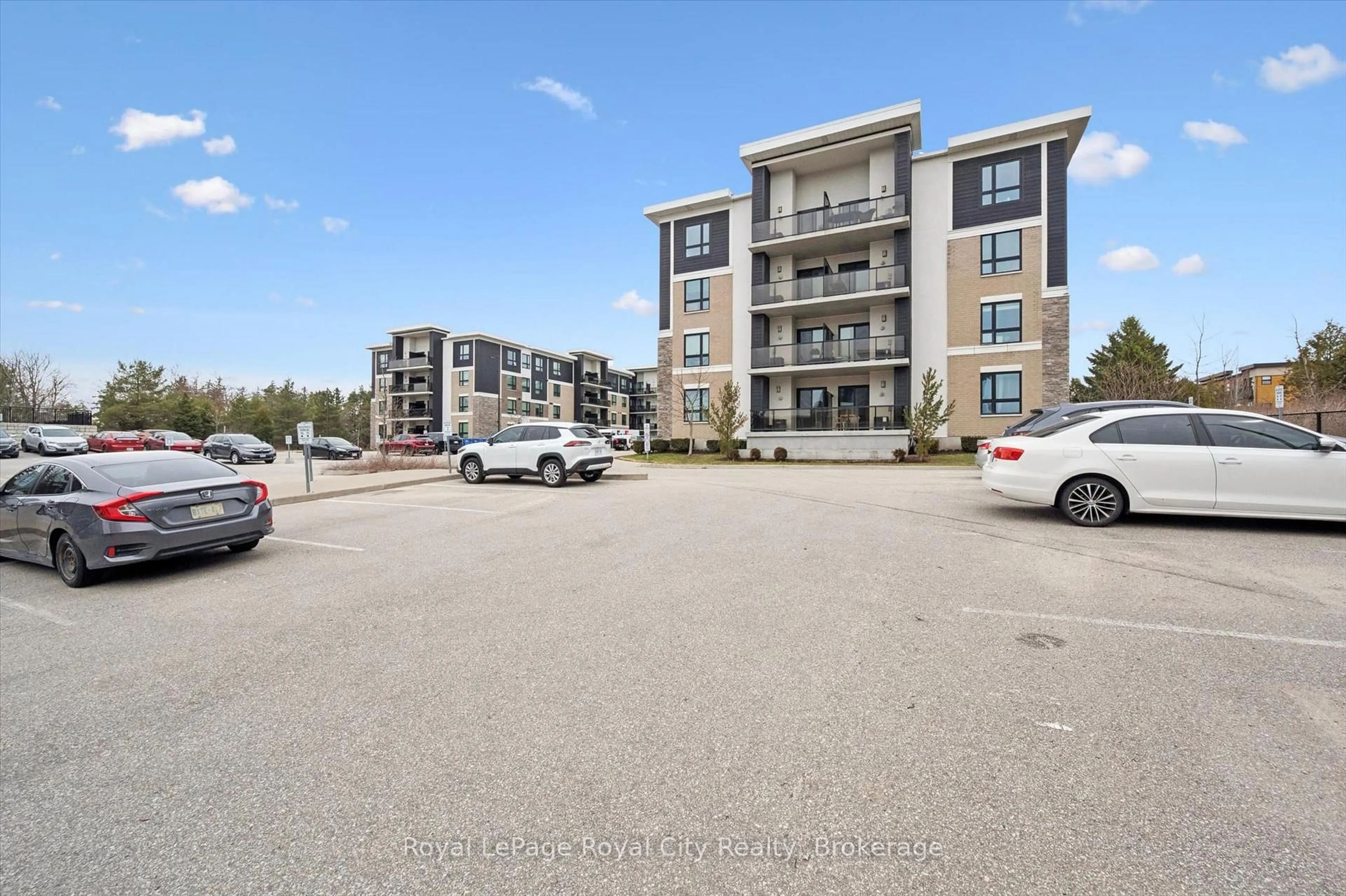 A pic from outside/outdoor area/front of a property/back of a property/a pic from drone, unknown for 1284 Gordon St #229, Guelph Ontario N1L 0M8