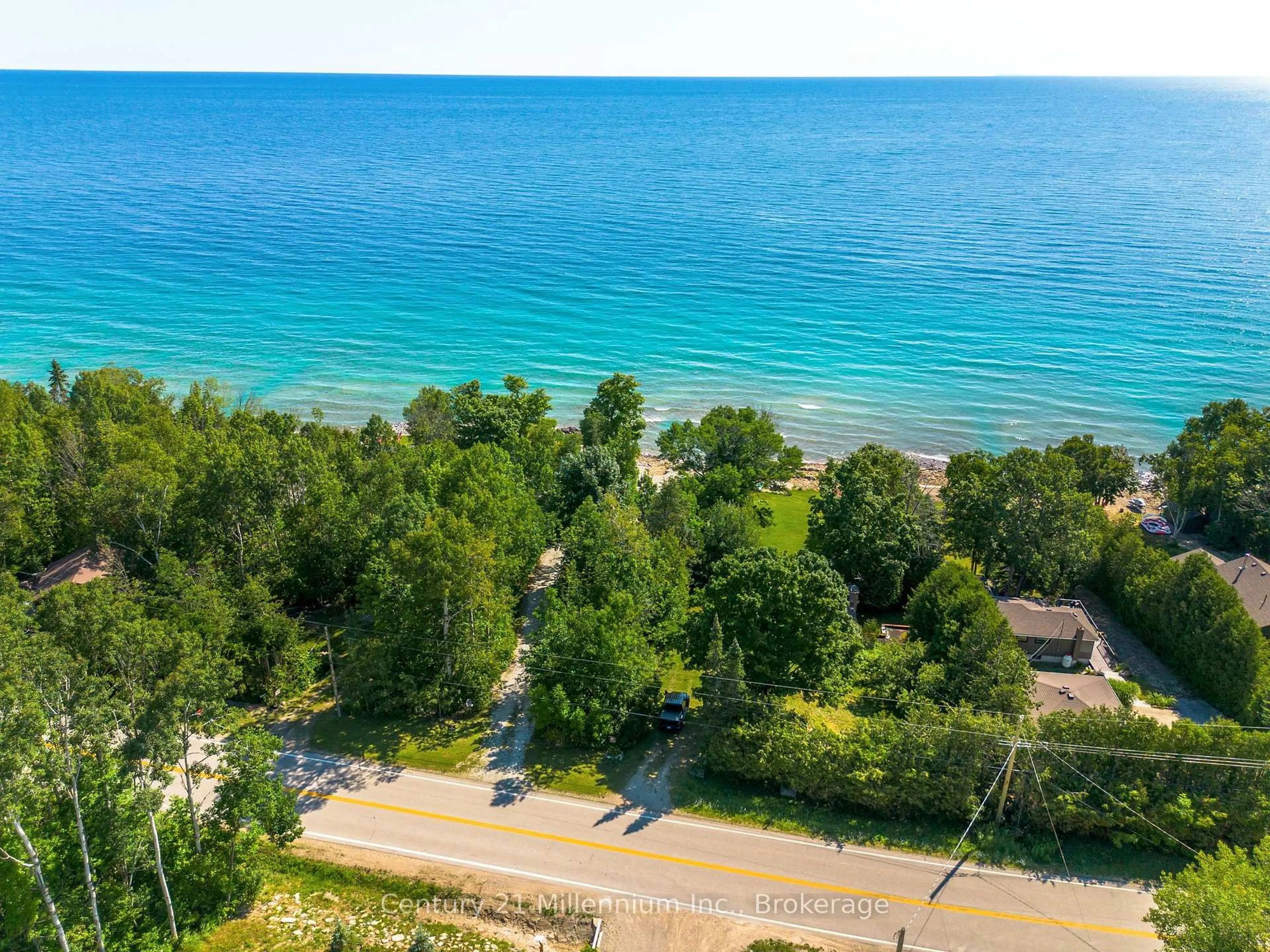 A pic from outside/outdoor area/front of a property/back of a property/a pic from drone, water/lake/river/ocean view for 504725 Grey 1 Rd, Georgian Bluffs Ontario N0H 1S0