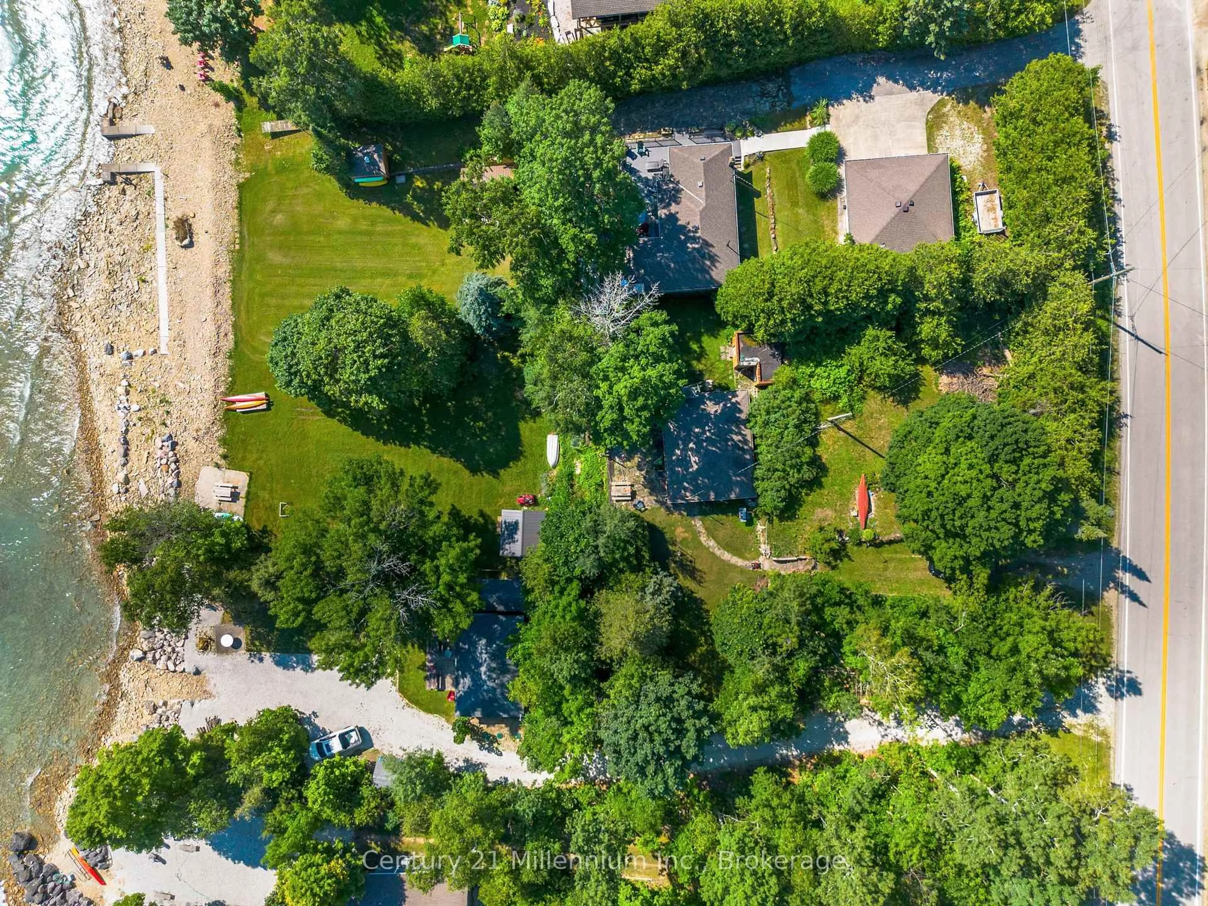 A pic from outside/outdoor area/front of a property/back of a property/a pic from drone, forest/trees view for 504725 Grey 1 Rd, Georgian Bluffs Ontario N0H 1S0