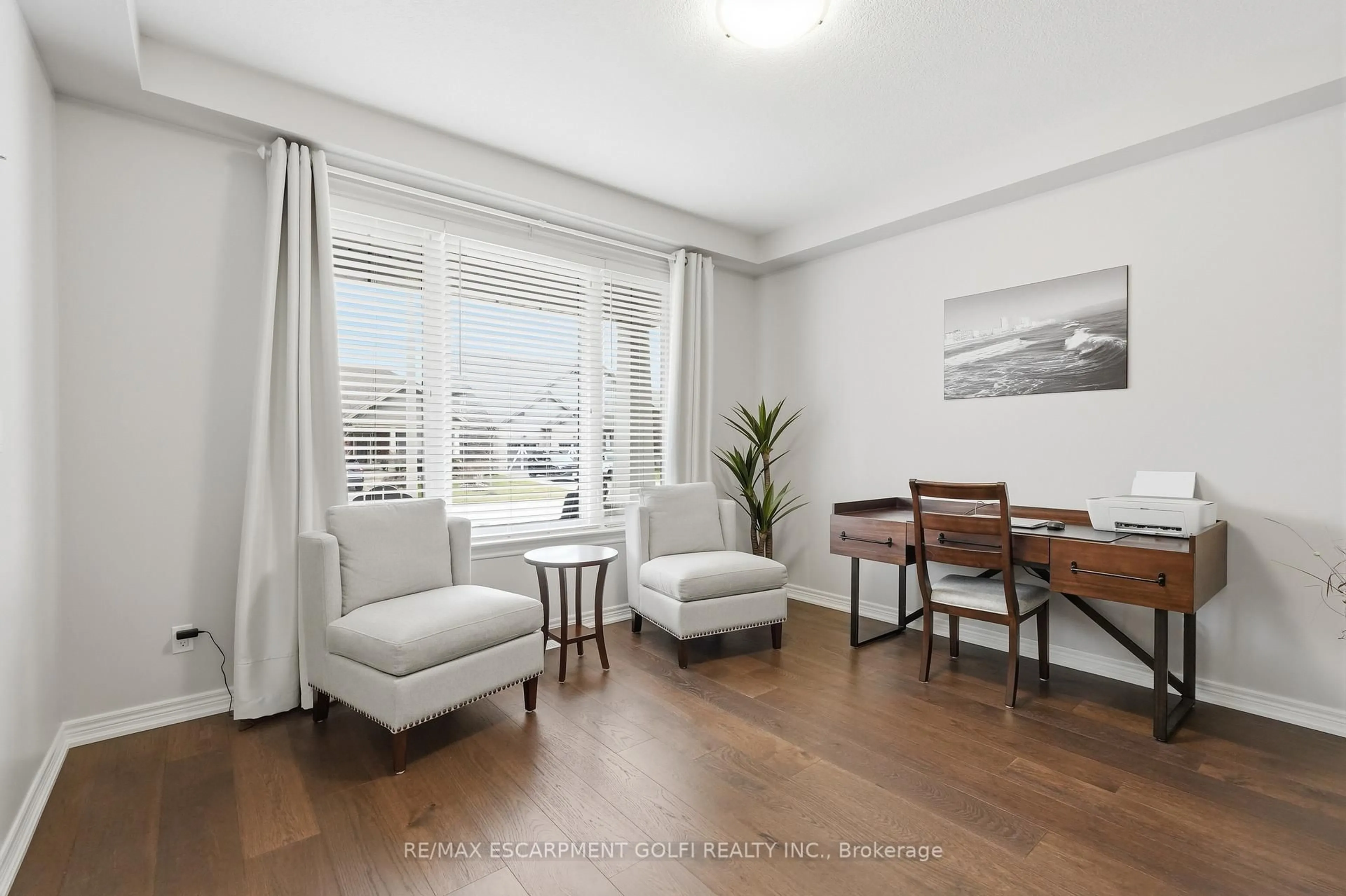 Living room with furniture, wood/laminate floor for 94 Anastasia Blvd, West Lincoln Ontario L0R 2A0