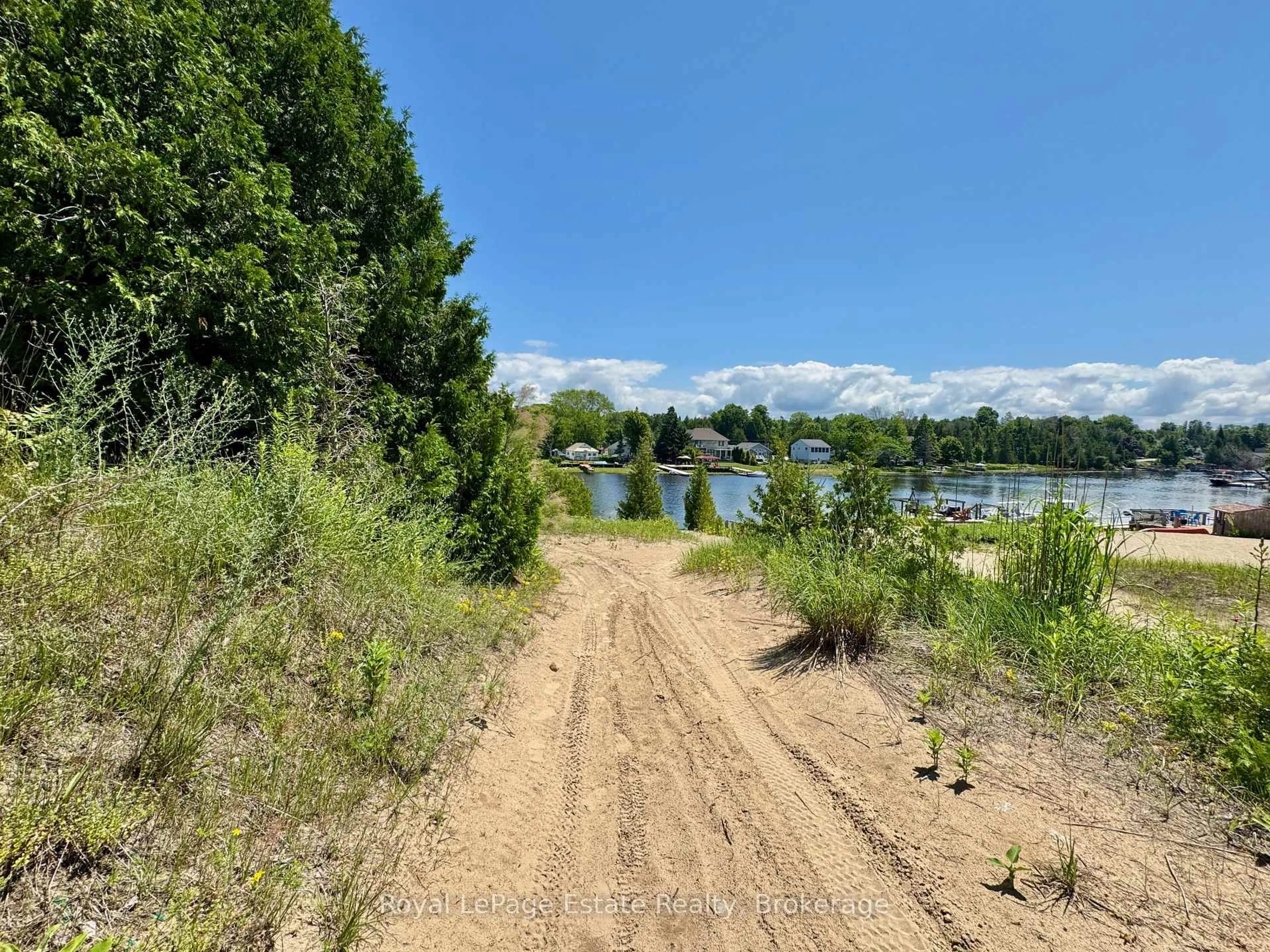 A pic from outside/outdoor area/front of a property/back of a property/a pic from drone, water/lake/river/ocean view for 234 Ogimah Rd, Native Leased Lands Ontario N0H 2G0