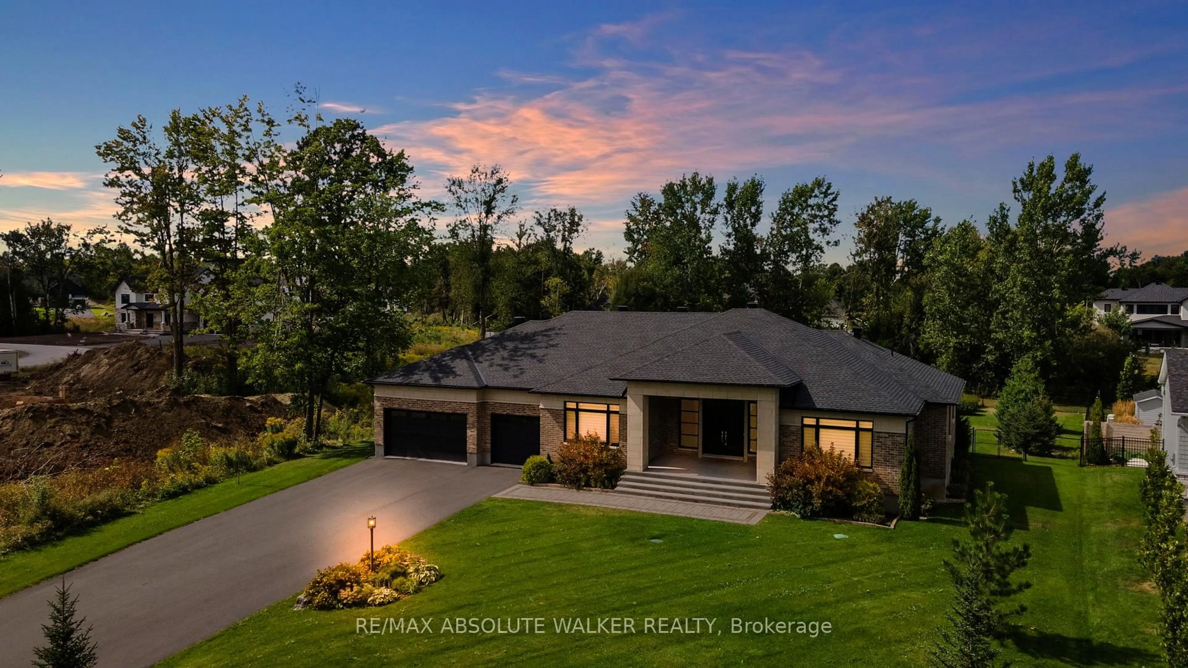 A pic from outside/outdoor area/front of a property/back of a property/a pic from drone, water/lake/river/ocean view for 700 Mcmanus Ave, Manotick Ontario K4M 0B2