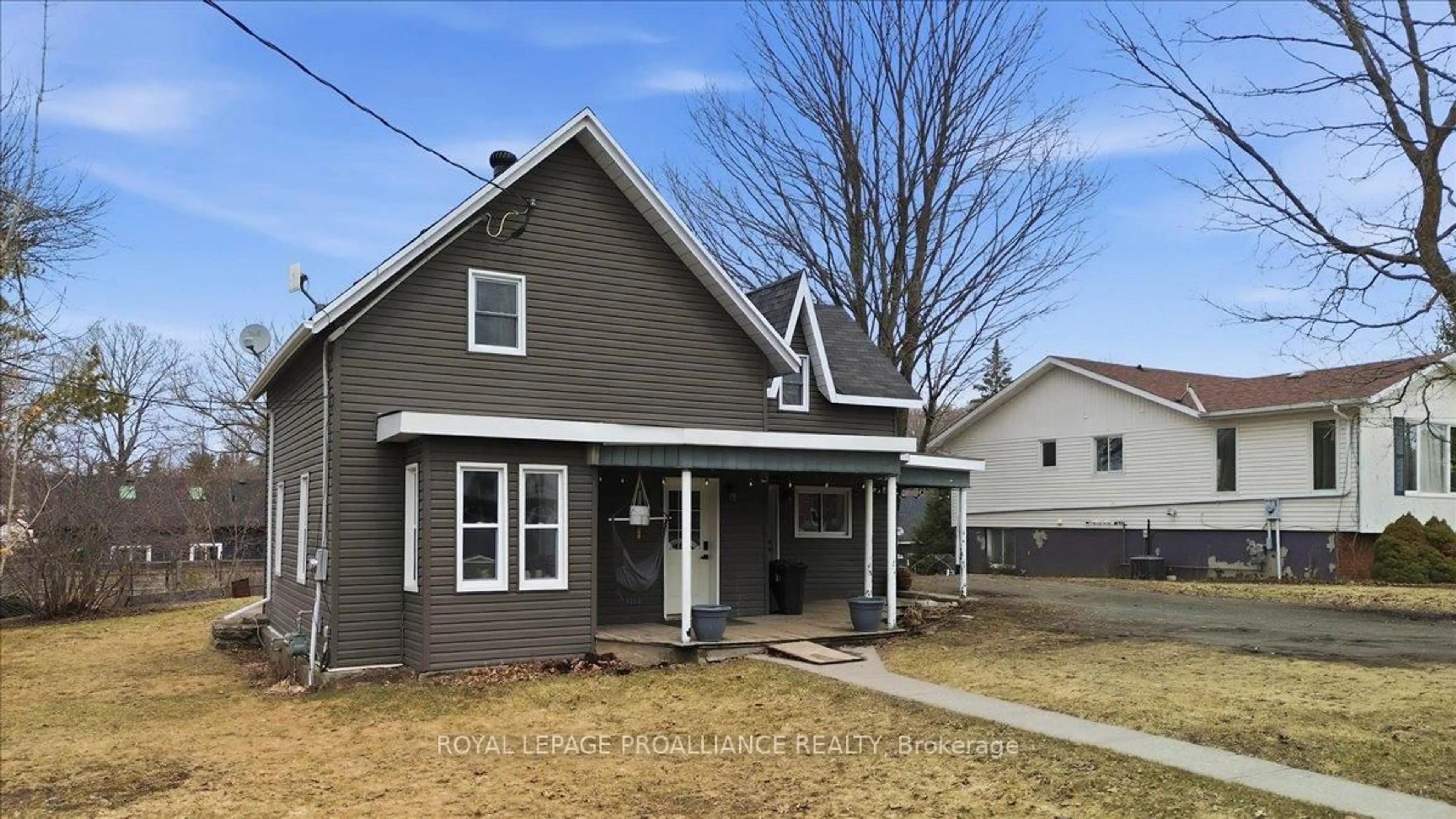 Home with vinyl exterior material, street for 61 Madoc St, Limoges Ontario K0K 2M0