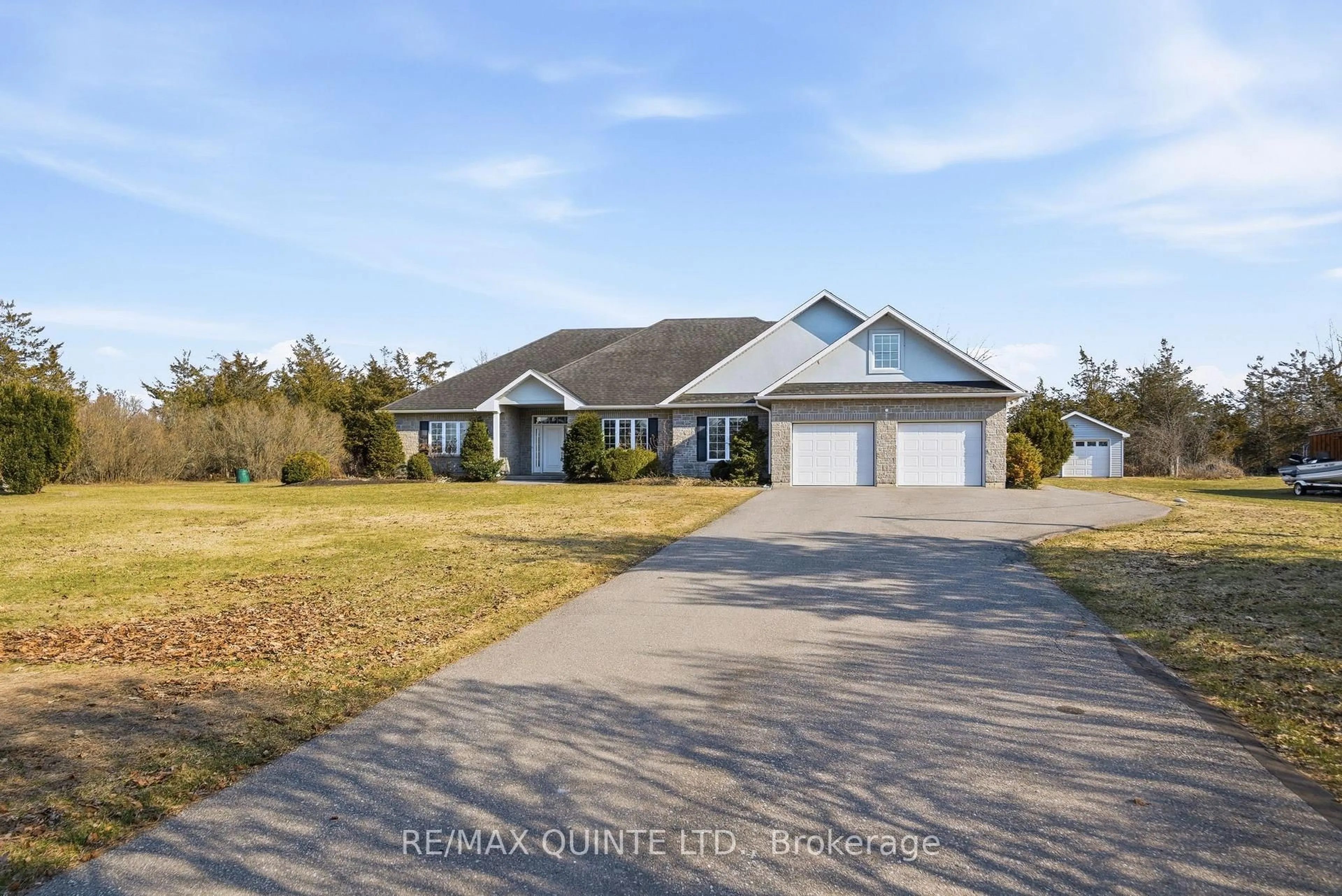 A pic from outside/outdoor area/front of a property/back of a property/a pic from drone, street for 3717 County Rd 3 Rd, Prince Edward County Ontario K0K 1L0