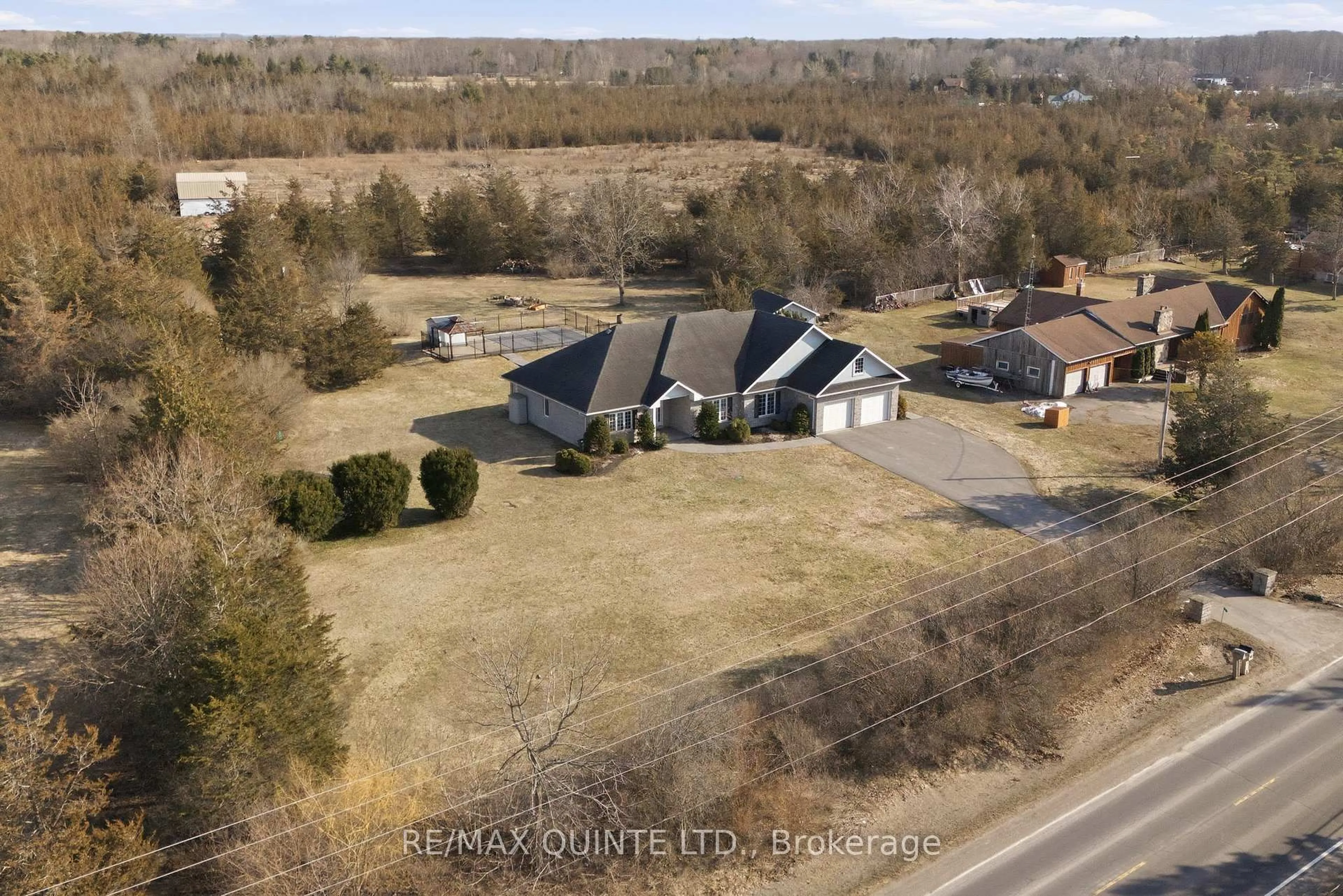 A pic from outside/outdoor area/front of a property/back of a property/a pic from drone, street for 3717 County Rd 3 Rd, Prince Edward County Ontario K0K 1L0