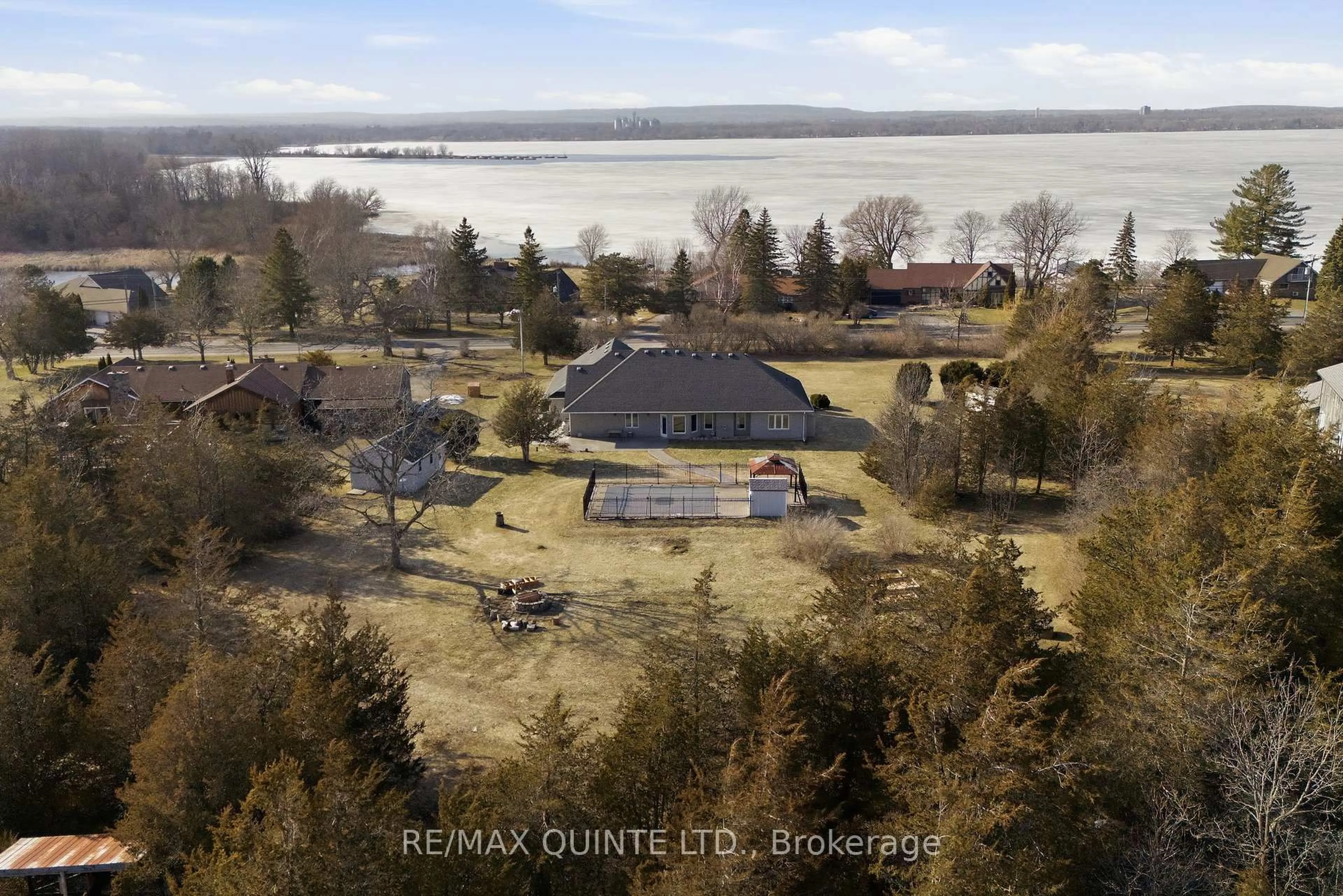 A pic from outside/outdoor area/front of a property/back of a property/a pic from drone, water/lake/river/ocean view for 3717 County Rd 3 Rd, Prince Edward County Ontario K0K 1L0