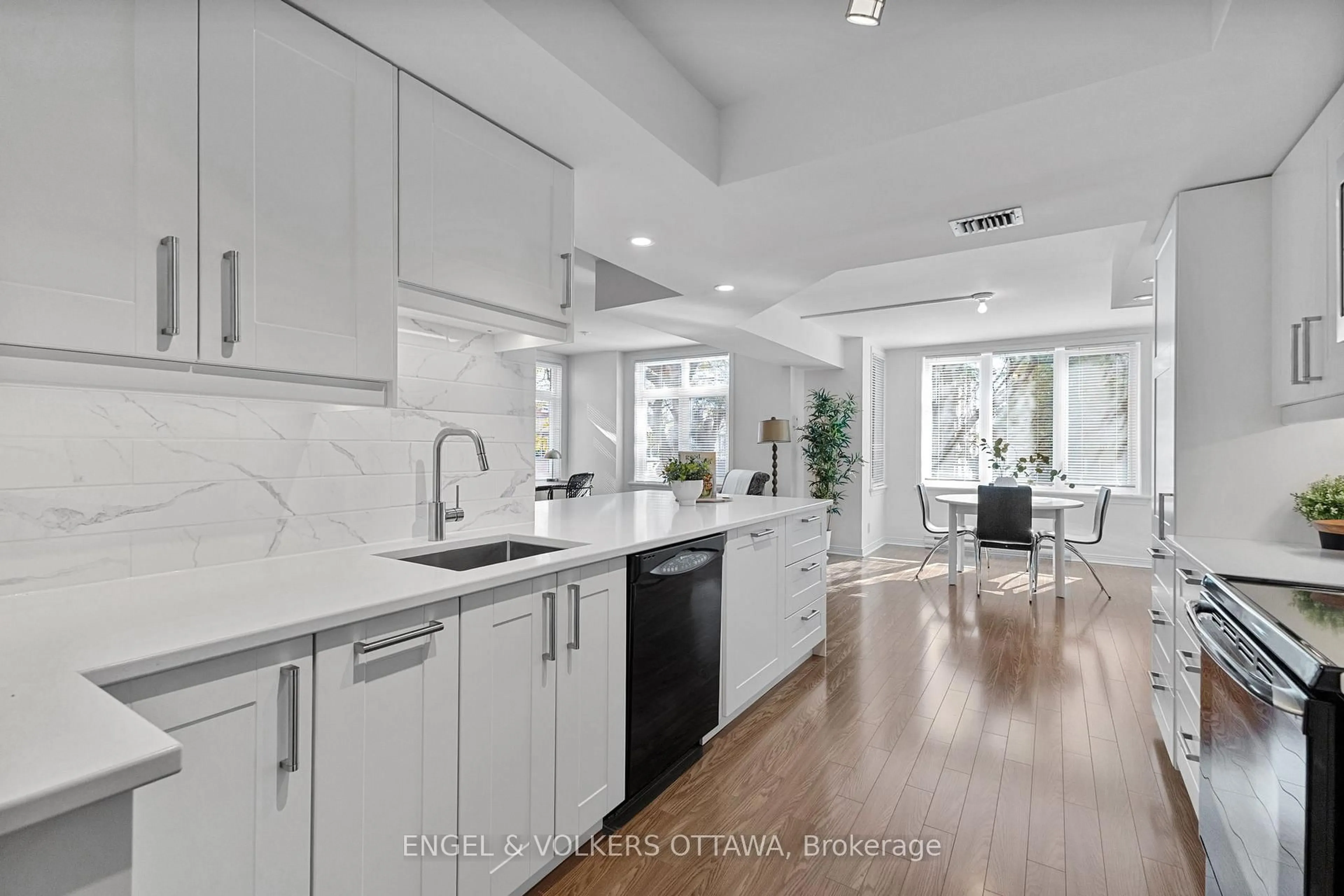 Open concept kitchen, ceramic/tile floor for 205 Somerset St #206, Ottawa Ontario K2P 0J1