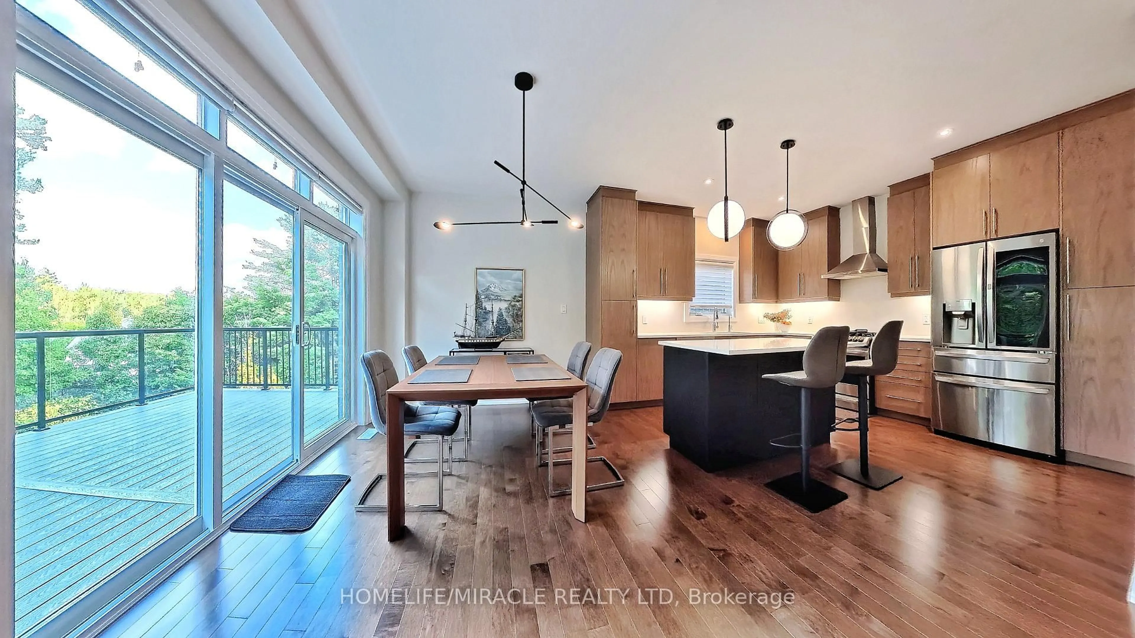 Open concept kitchen, wood/laminate floor for 63 Ian Ormston Dr, Kitchener Ontario N2P 0K2