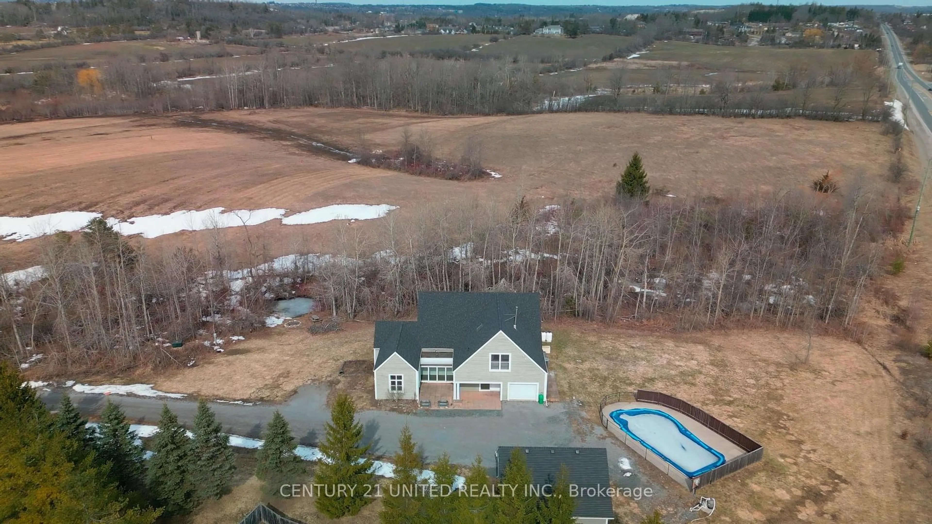 A pic from outside/outdoor area/front of a property/back of a property/a pic from drone, water/lake/river/ocean view for 590 Maniece Ave, Peterborough Ontario K9J 6X9