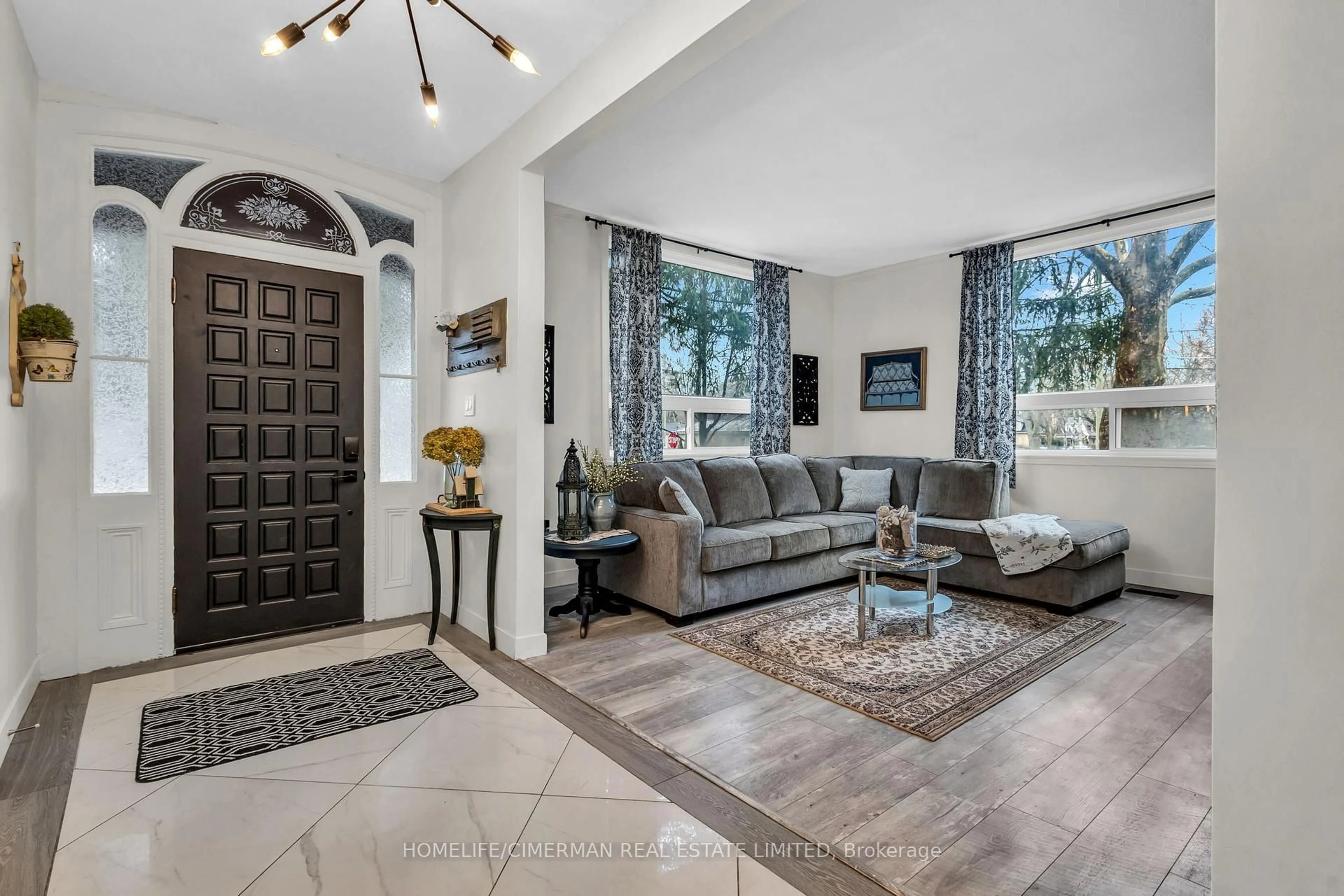 Living room with furniture, ceramic/tile floor for 406 Grey St, London East Ontario N6B 1H3