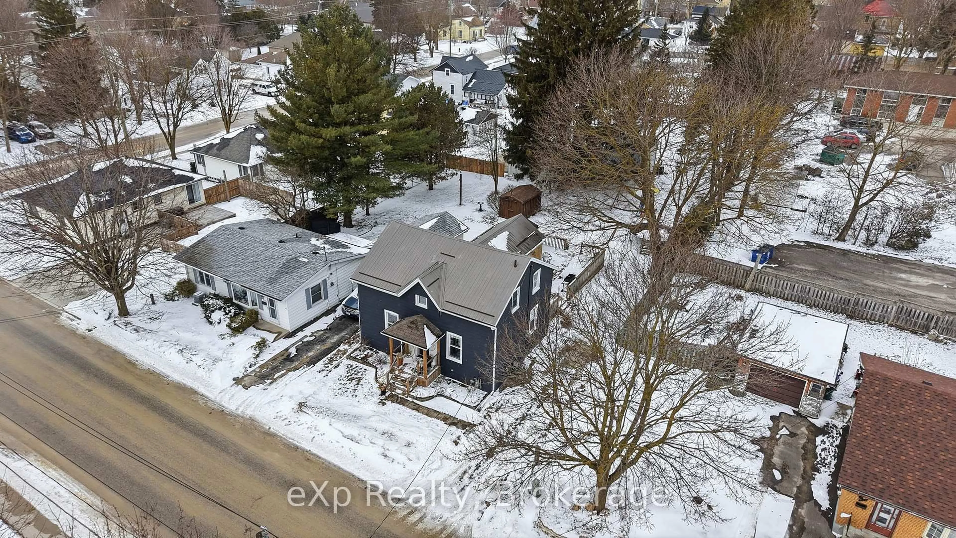 A pic from outside/outdoor area/front of a property/back of a property/a pic from drone, street for 255 Waterloo St, Wellington North Ontario N0G 2L3