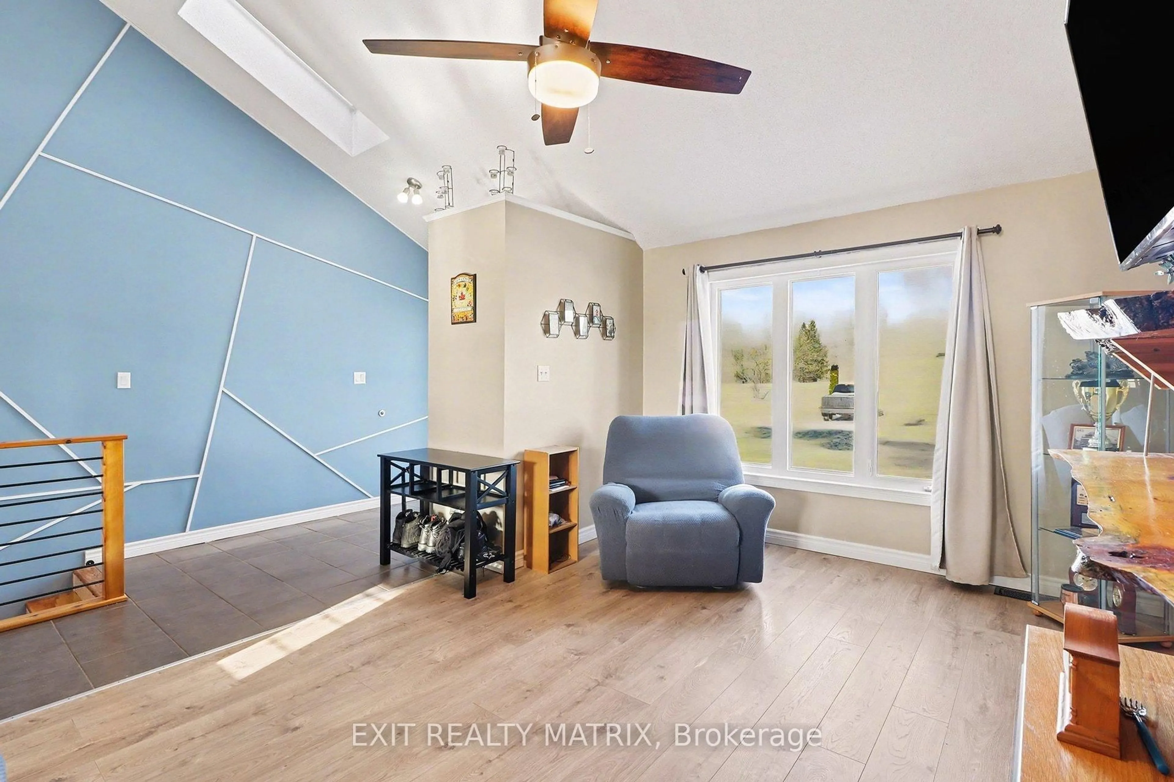 Living room with furniture, wood/laminate floor for 51 Marcel St, Russell Ontario K0A 1W0