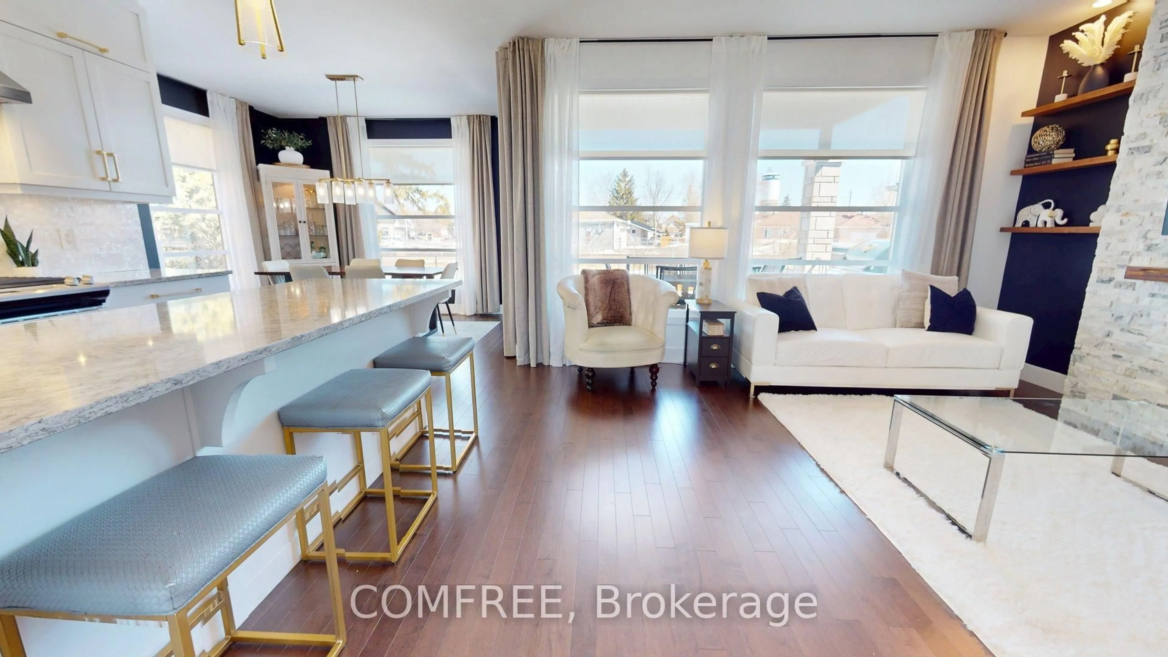 Living room with furniture, wood/laminate floor for 754 Saint Joseph St, Casselman Ontario K0A 1M0