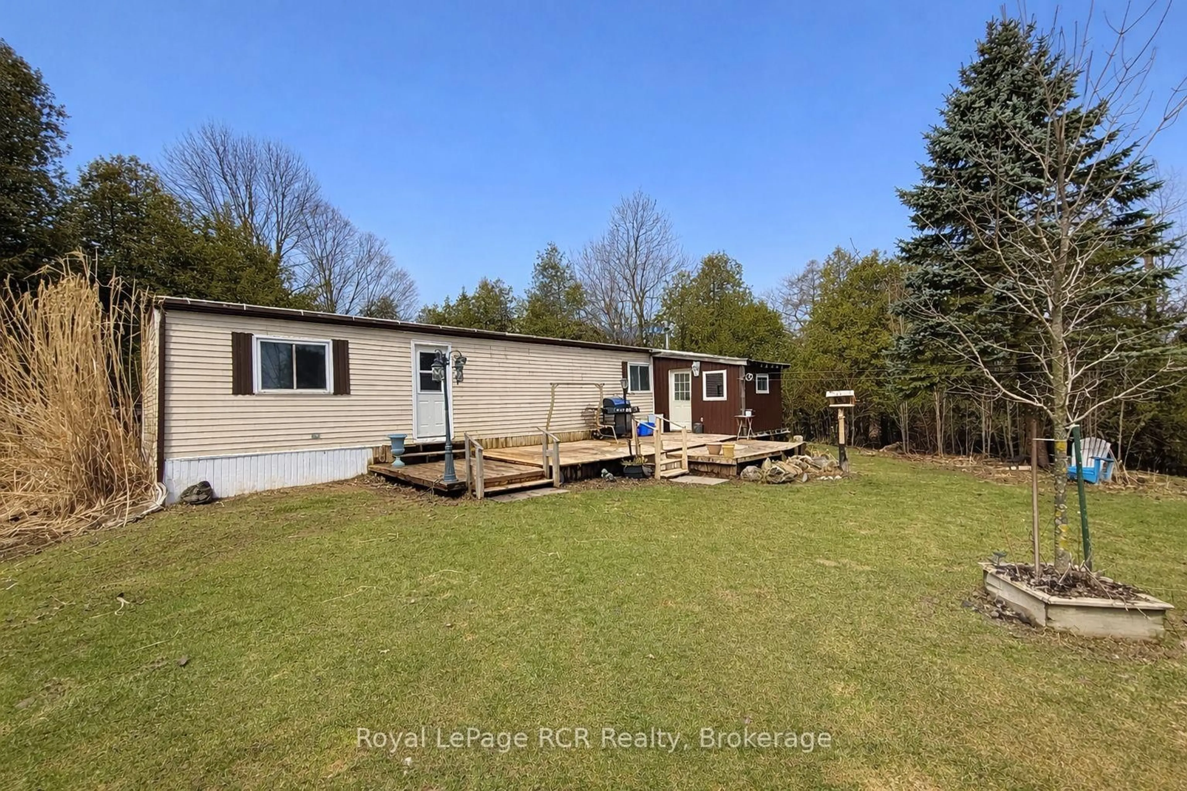A pic from outside/outdoor area/front of a property/back of a property/a pic from drone, water/lake/river/ocean view for 501265 10th Concession, West Grey Ontario N0G 1S0