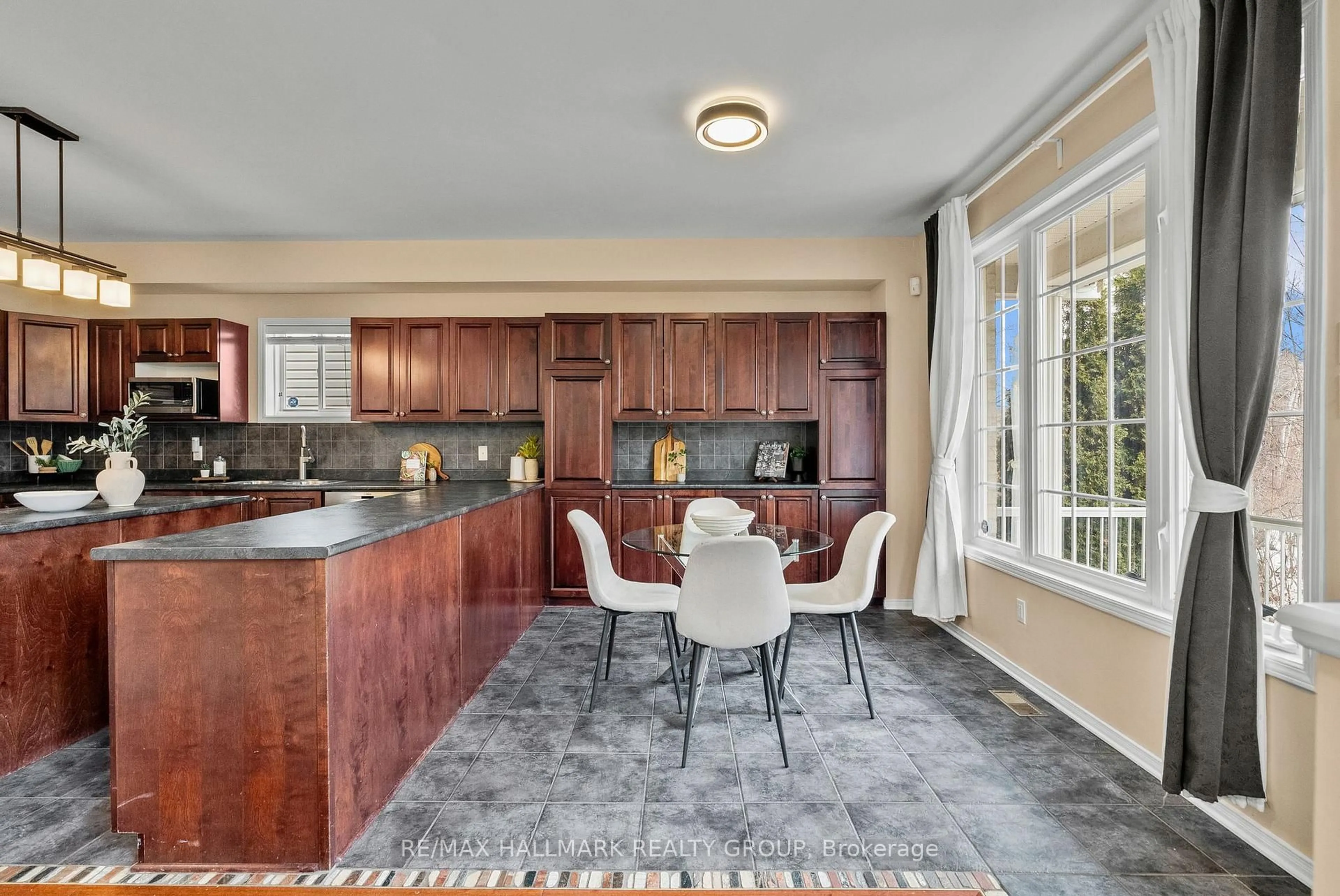 Open concept kitchen, ceramic/tile floor for 303 Parkin Circ, Ottawa Ontario K1T 4G8